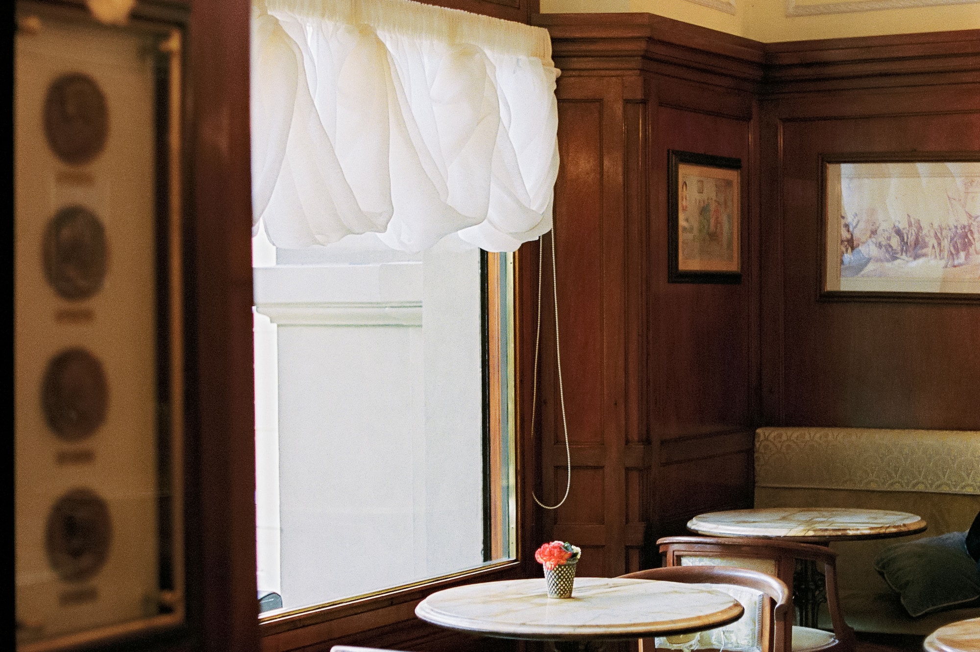 a room with tables and chairs