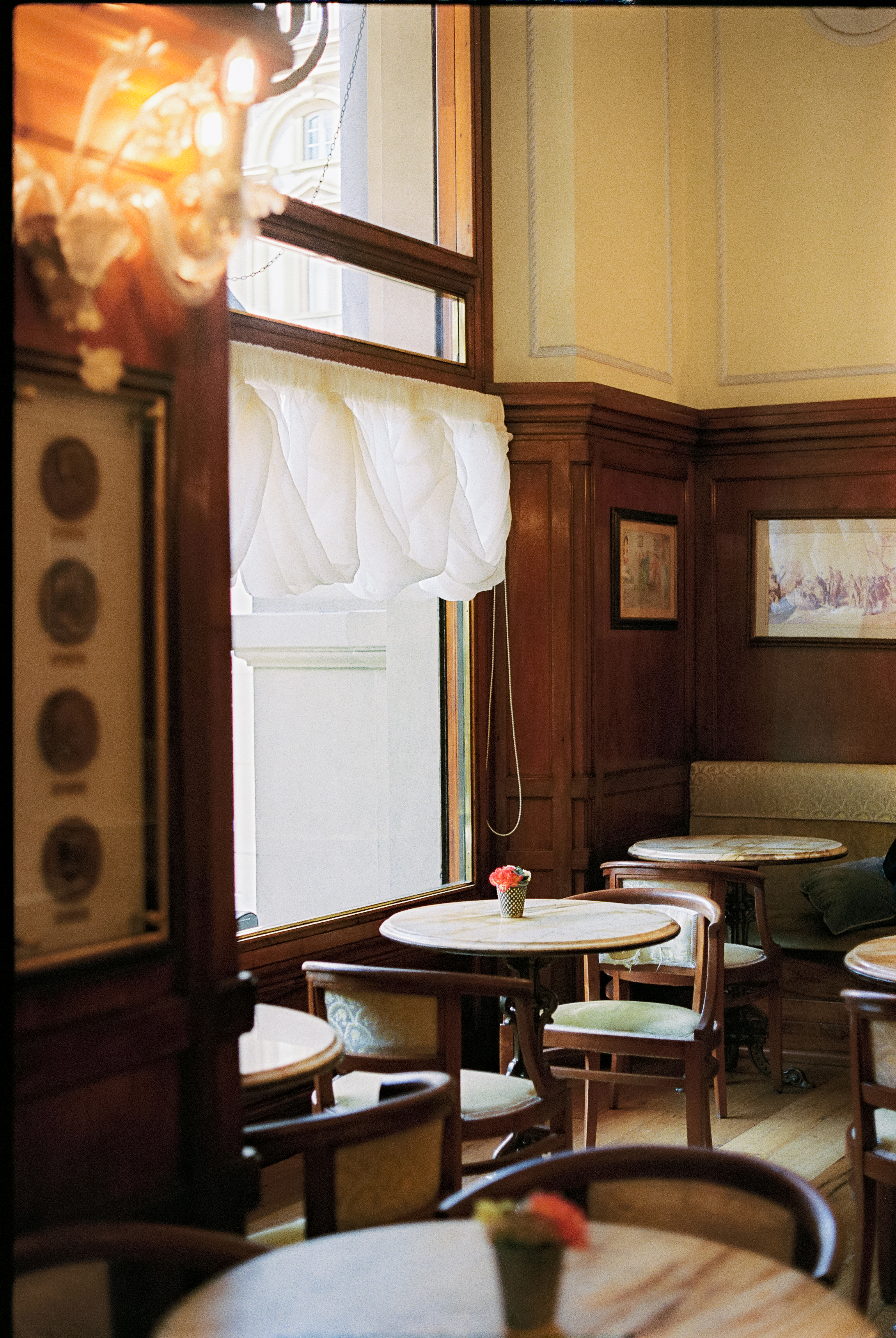 a room with tables and chairs