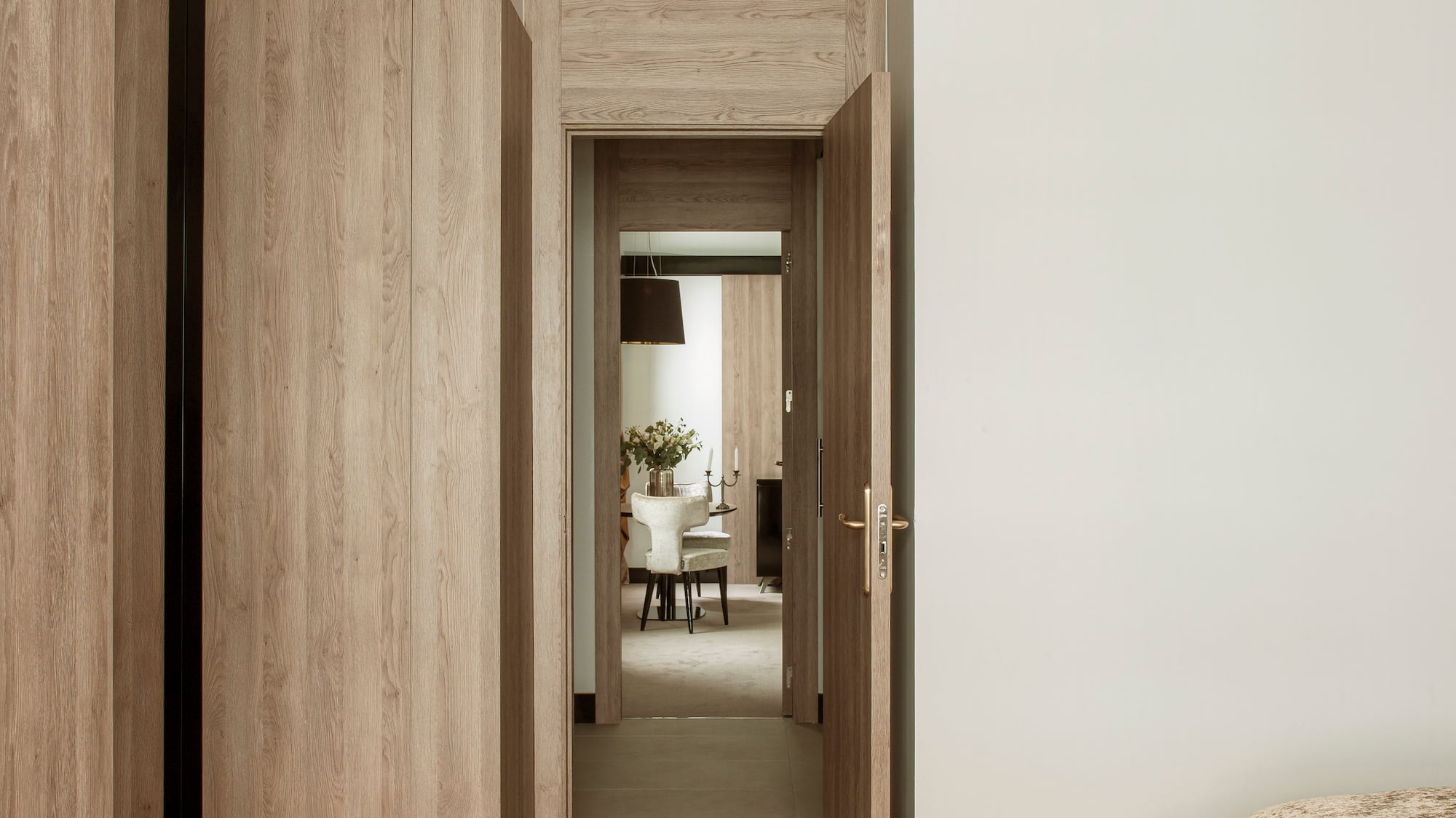 a room with a bed and a door