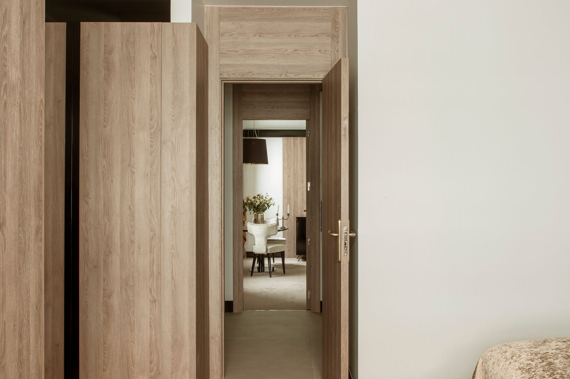 a room with a bed and a door