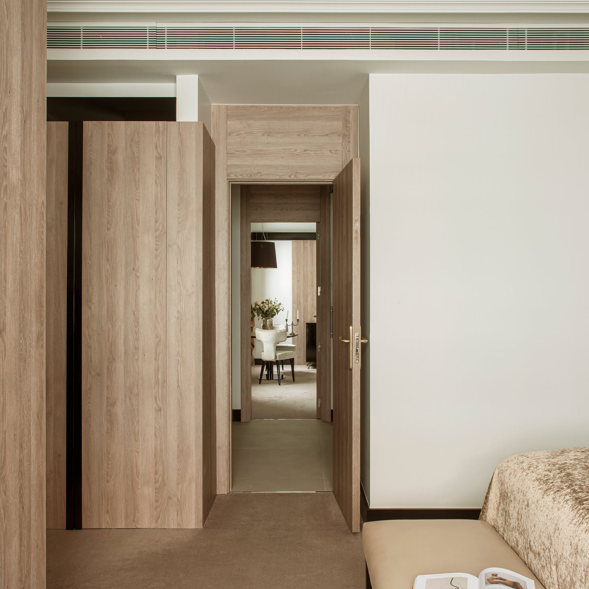 a room with a bed and a door