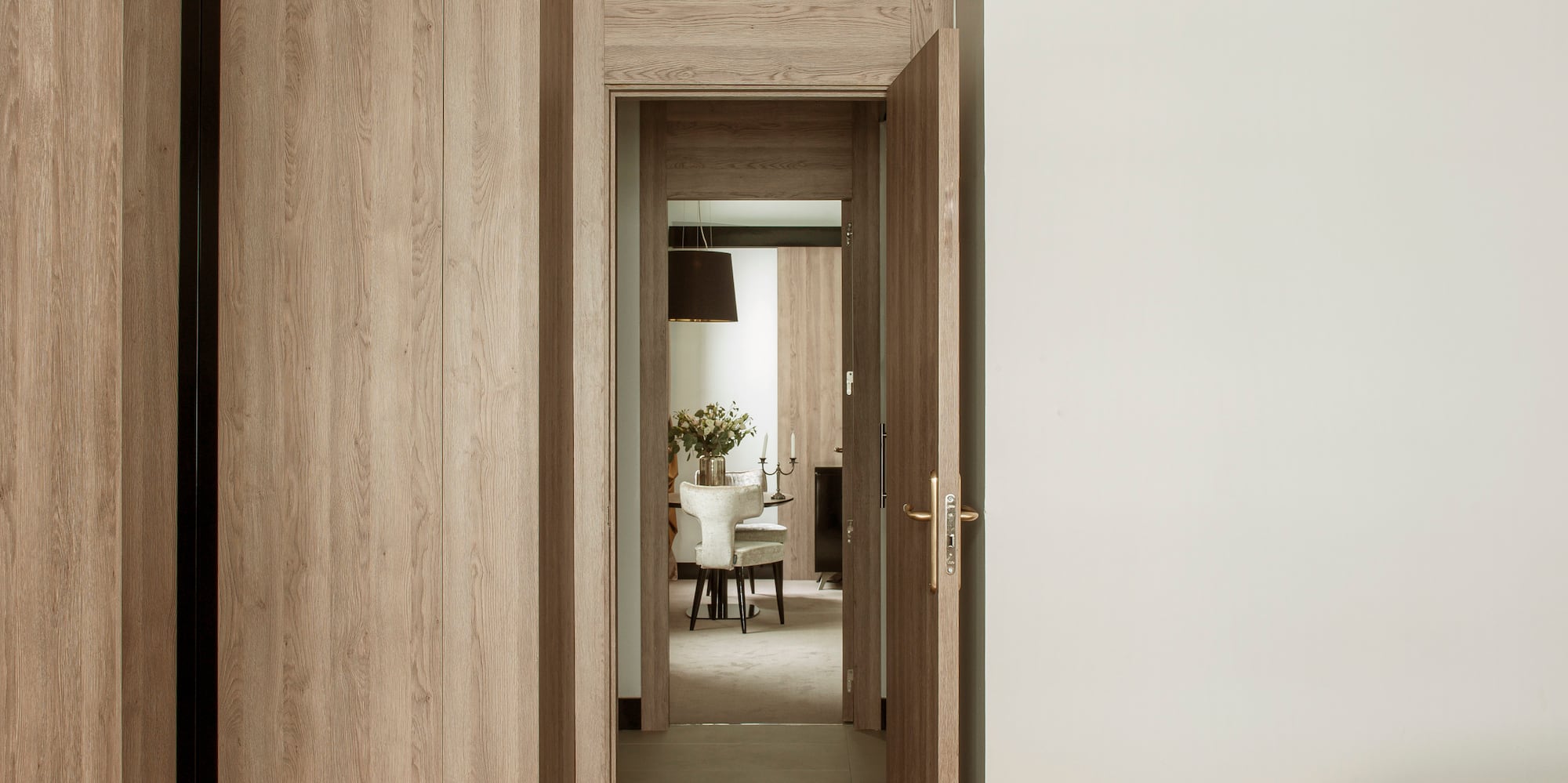 a room with a bed and a door