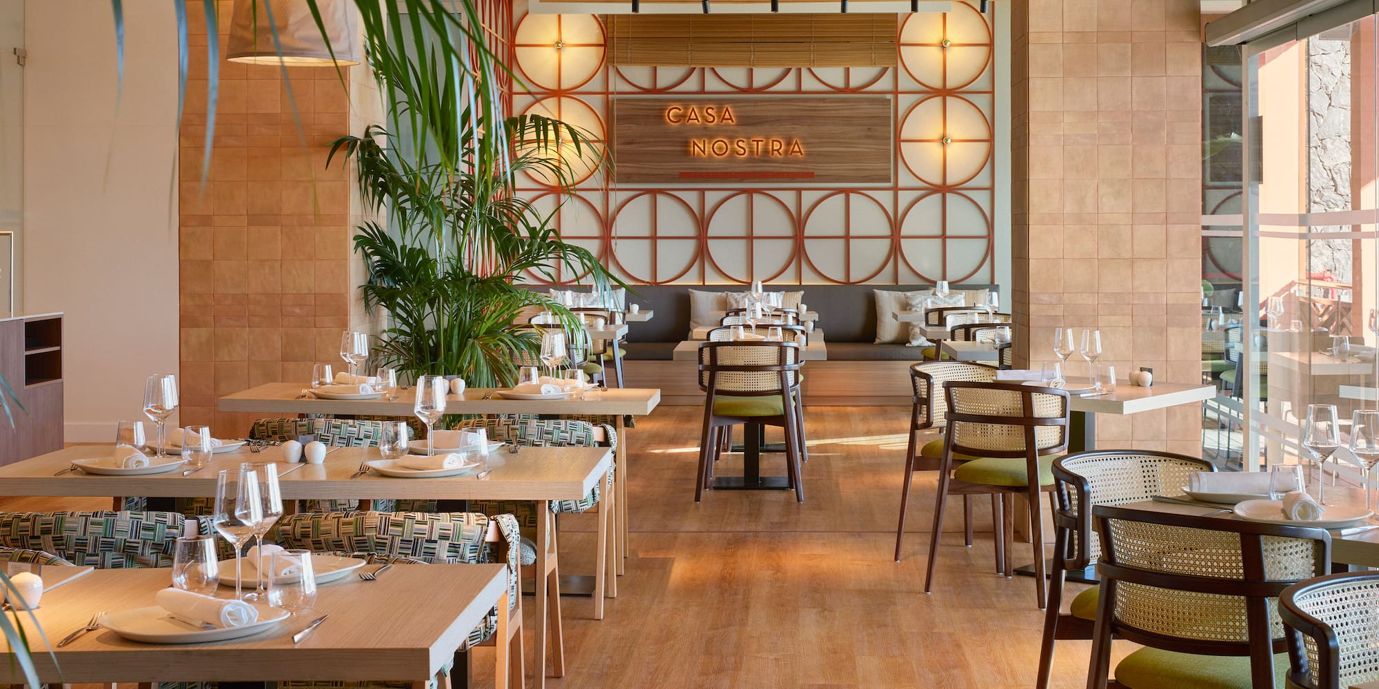 a restaurant with tables and chairs