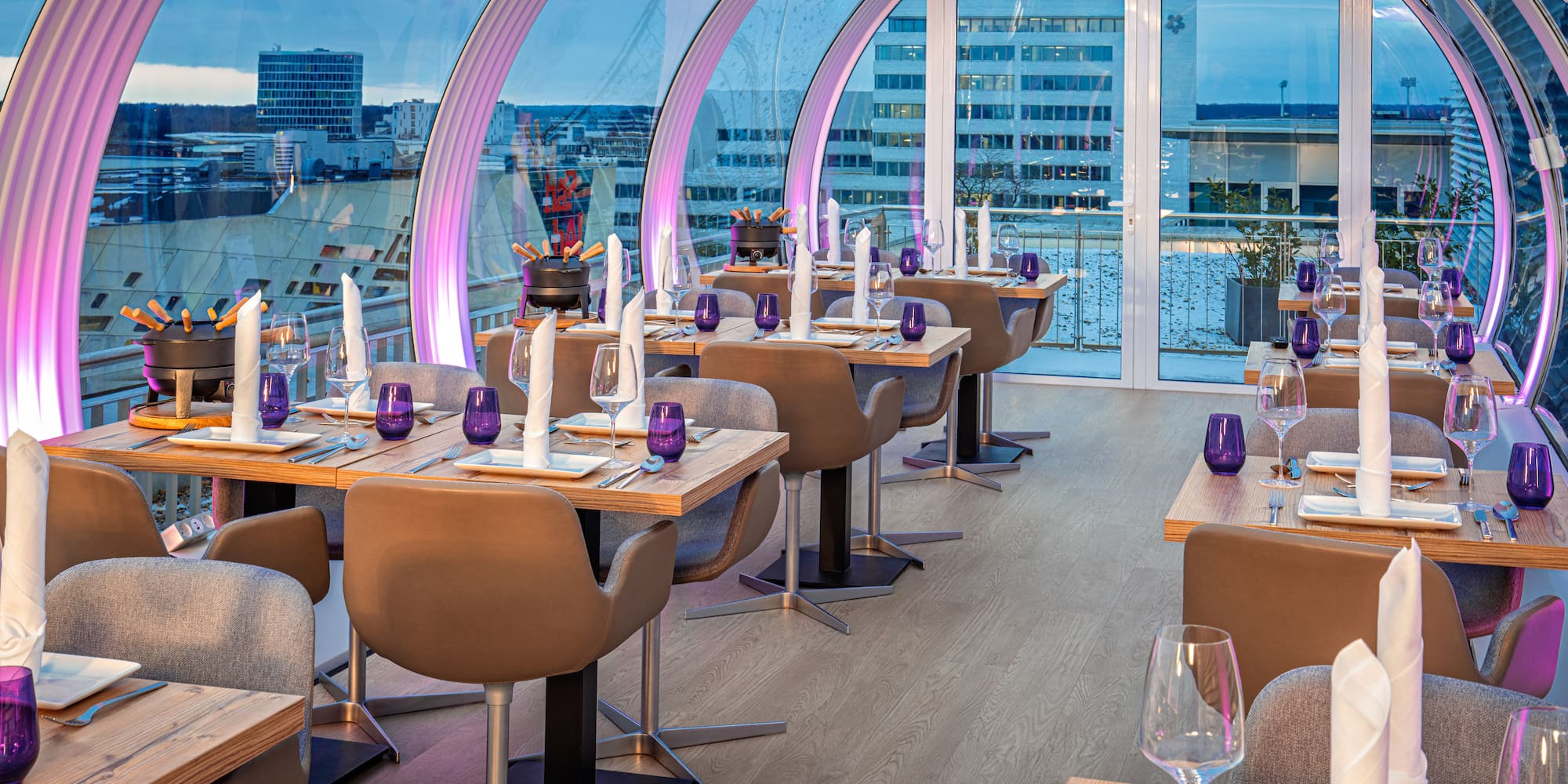 a restaurant with tables and chairs