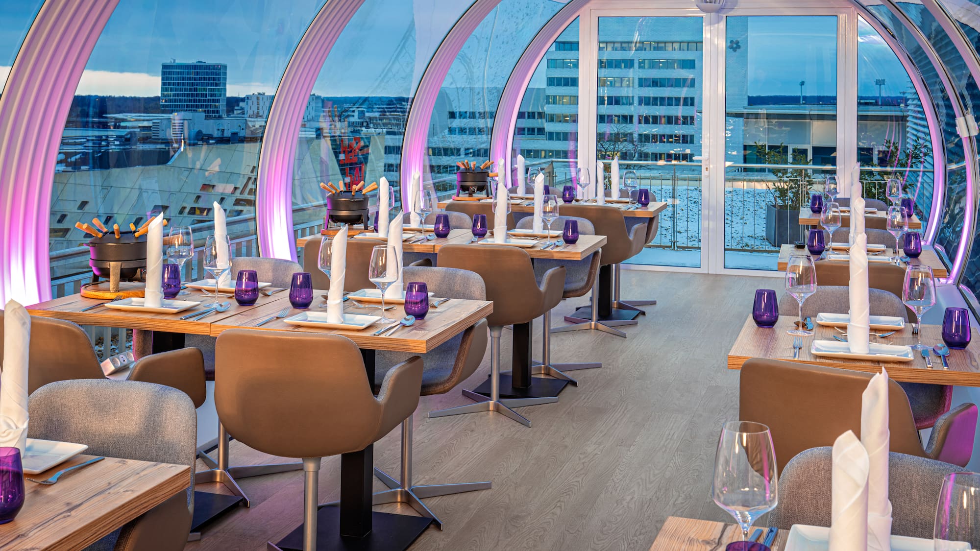 a restaurant with tables and chairs