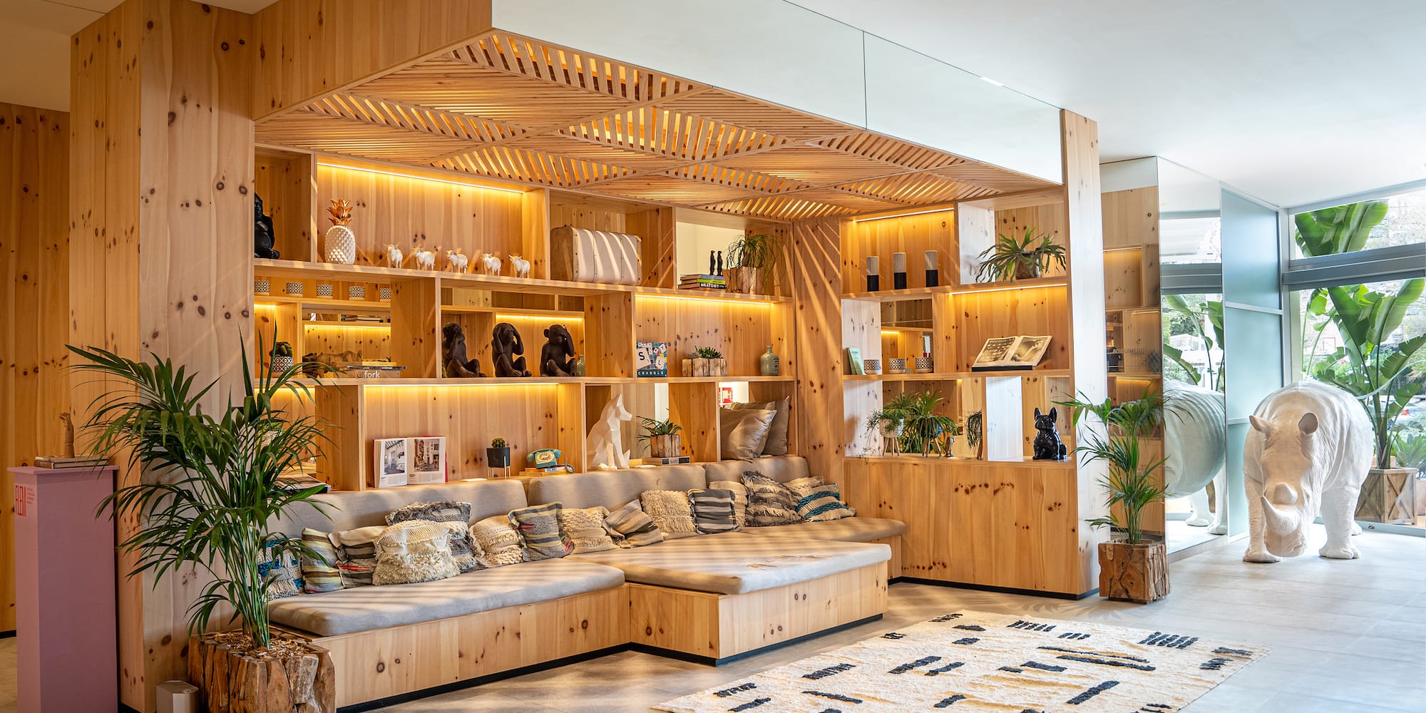 a room with a couch and shelves