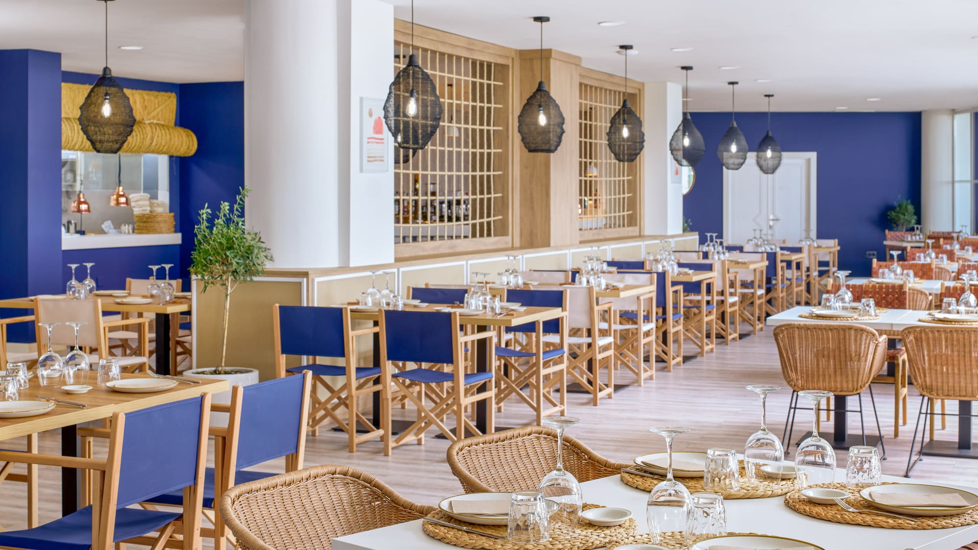 a restaurant with tables and chairs