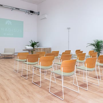 a room with chairs and a table