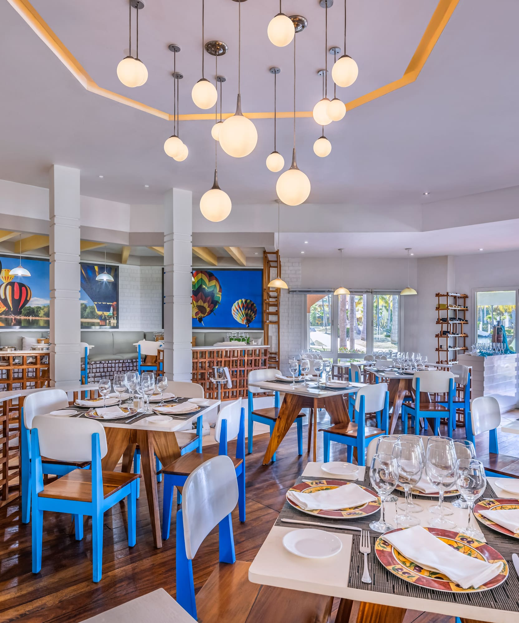 a restaurant with tables and chairs