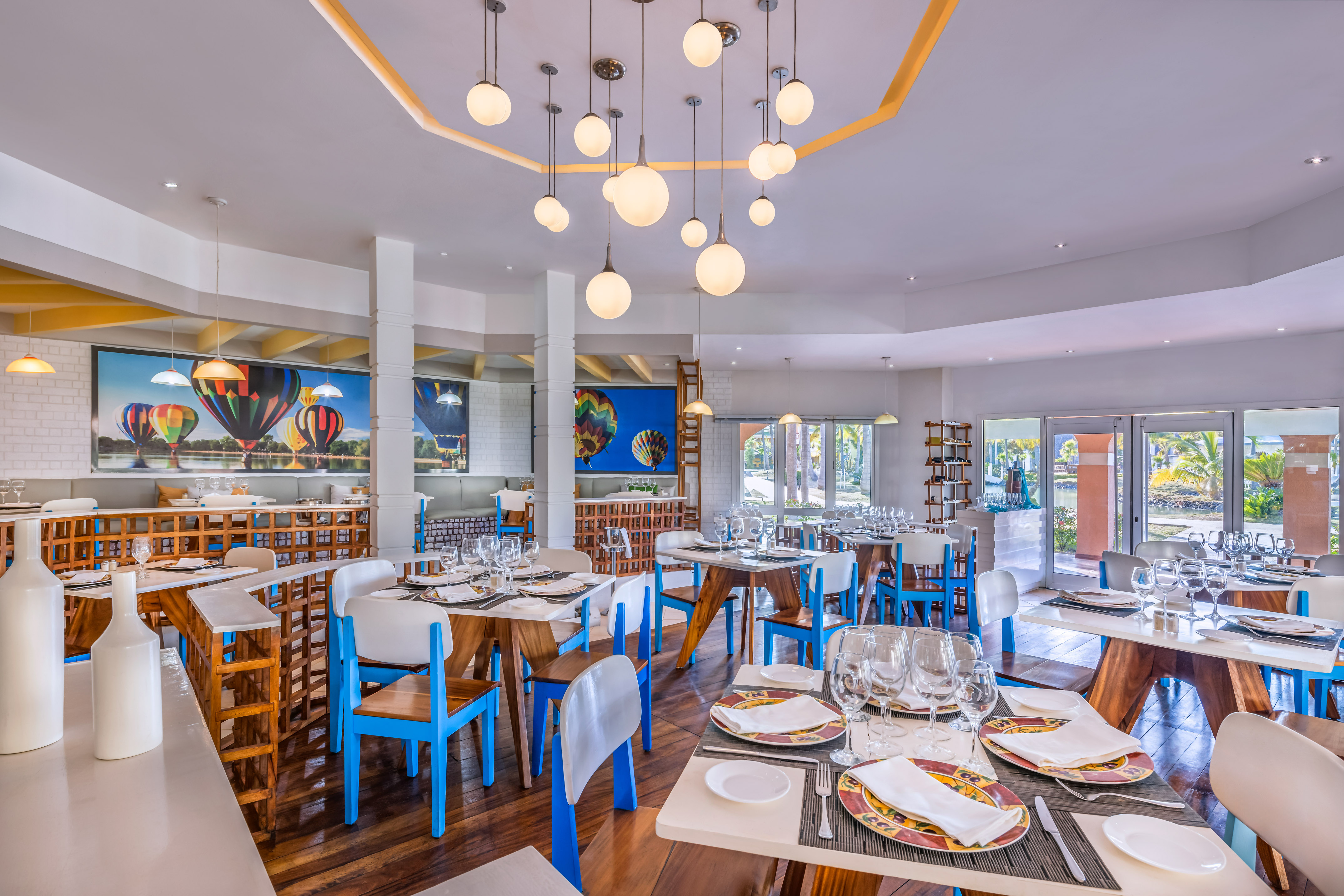 a restaurant with tables and chairs