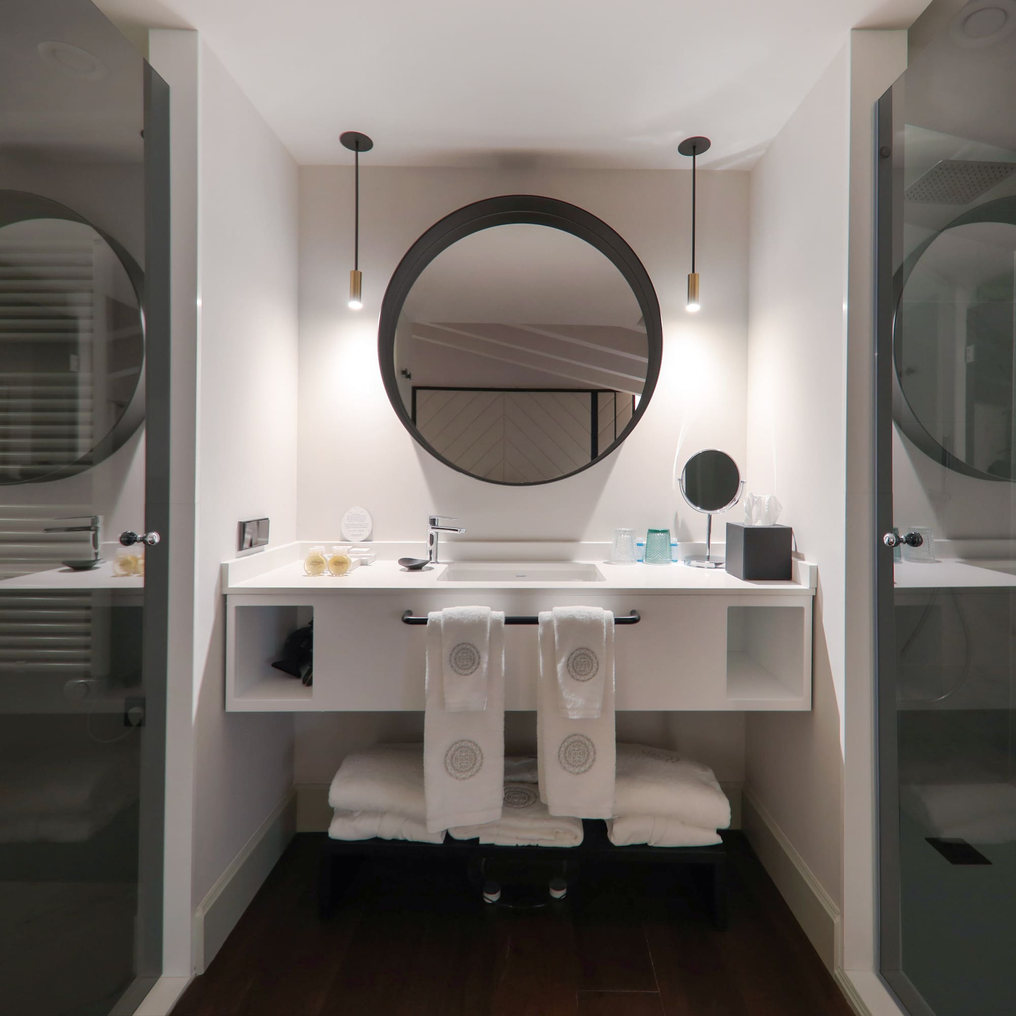 a bathroom with a mirror and a sink