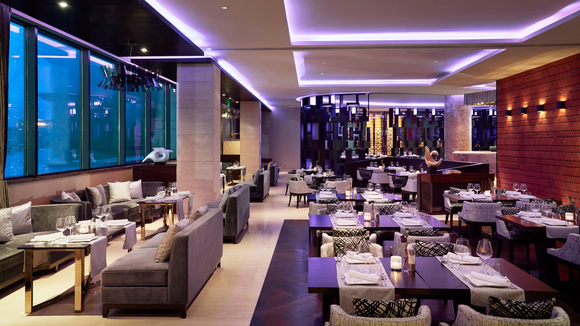 a restaurant with tables and chairs