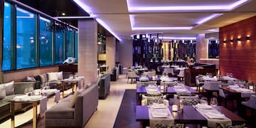 a restaurant with tables and chairs