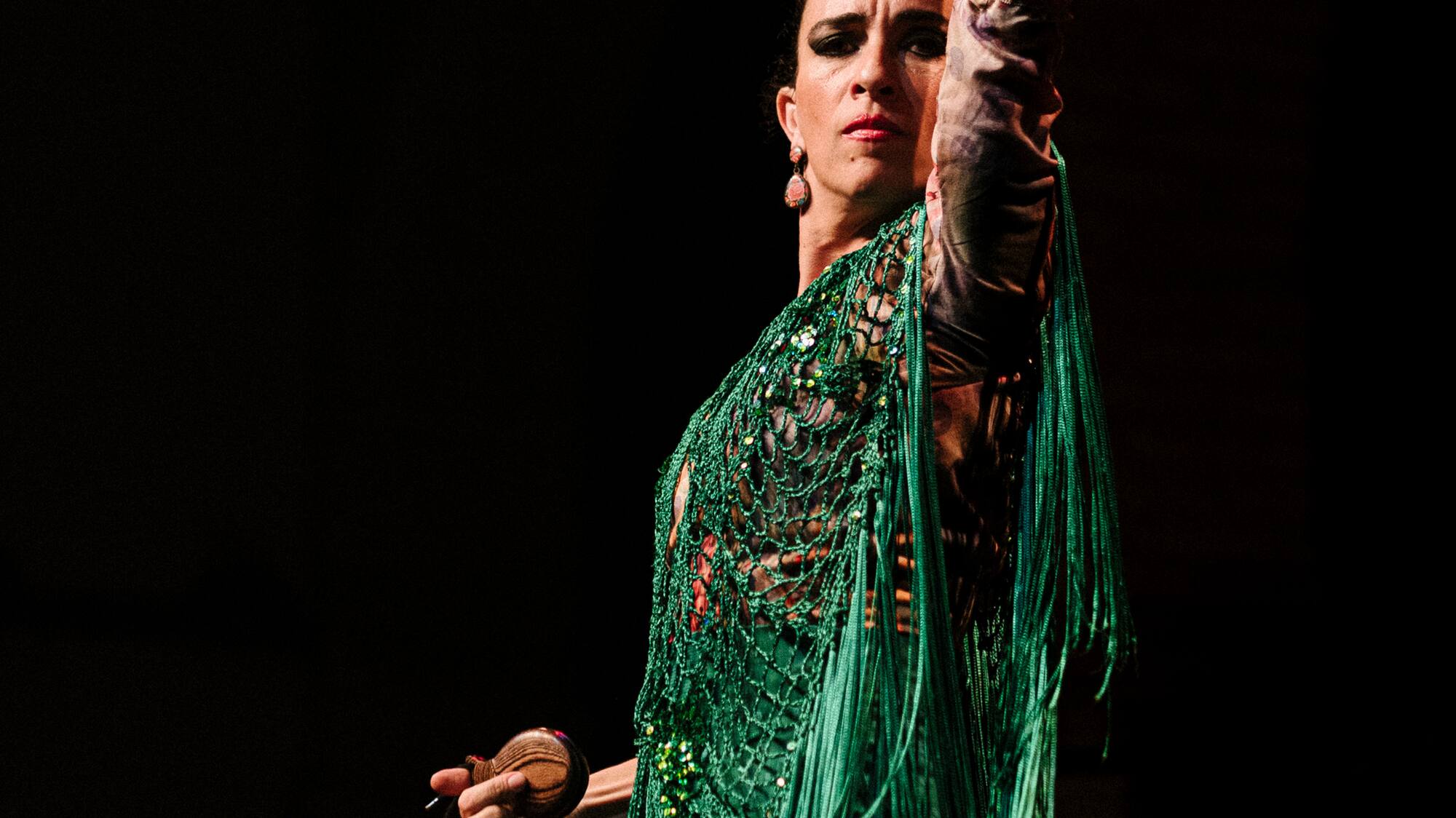 a woman in a green dress