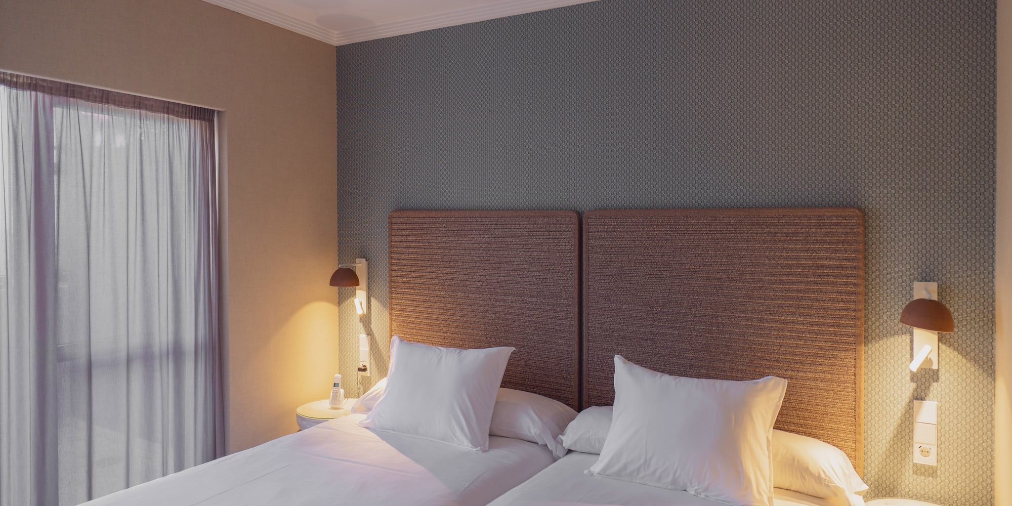 a two beds in a room