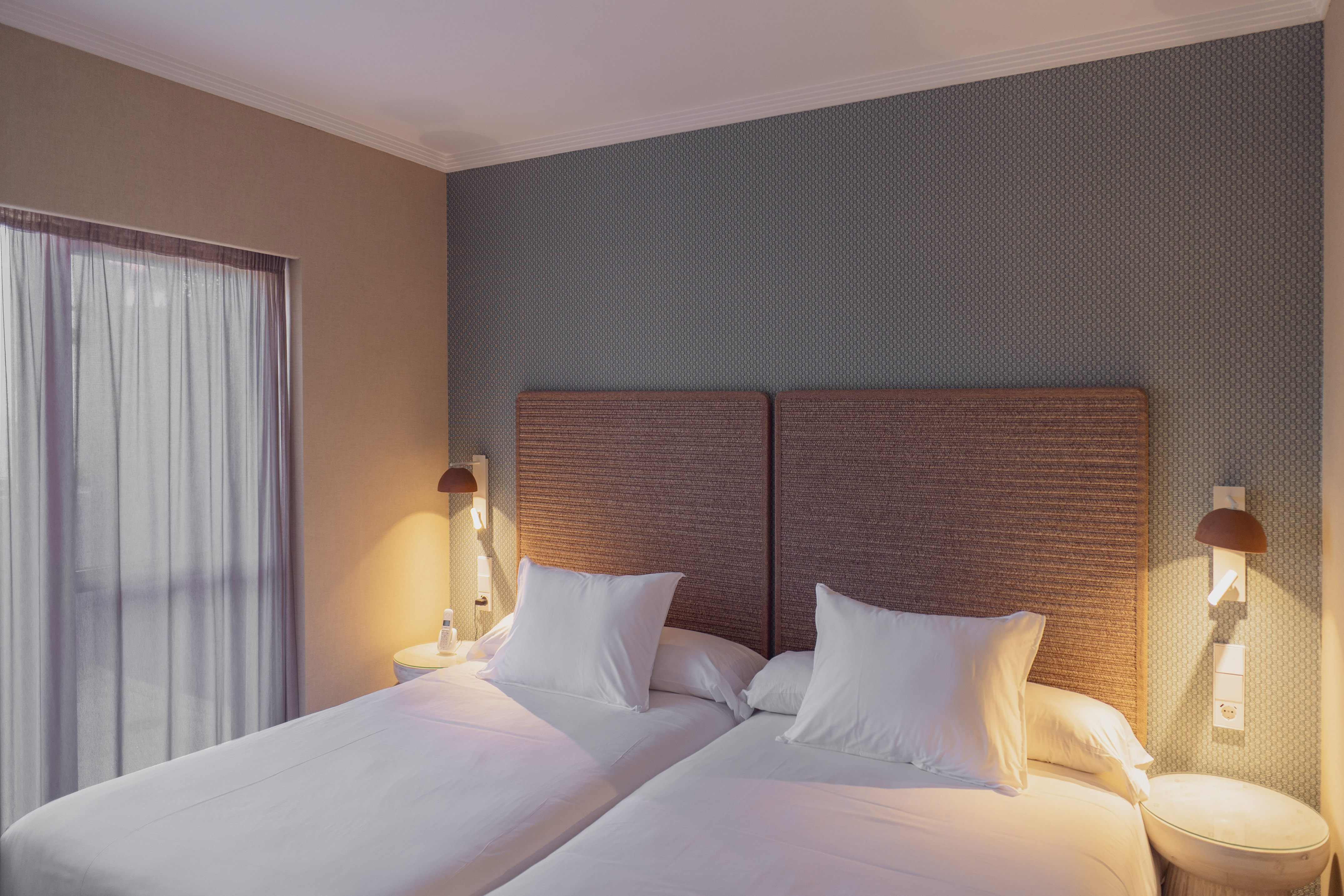 a two beds in a room