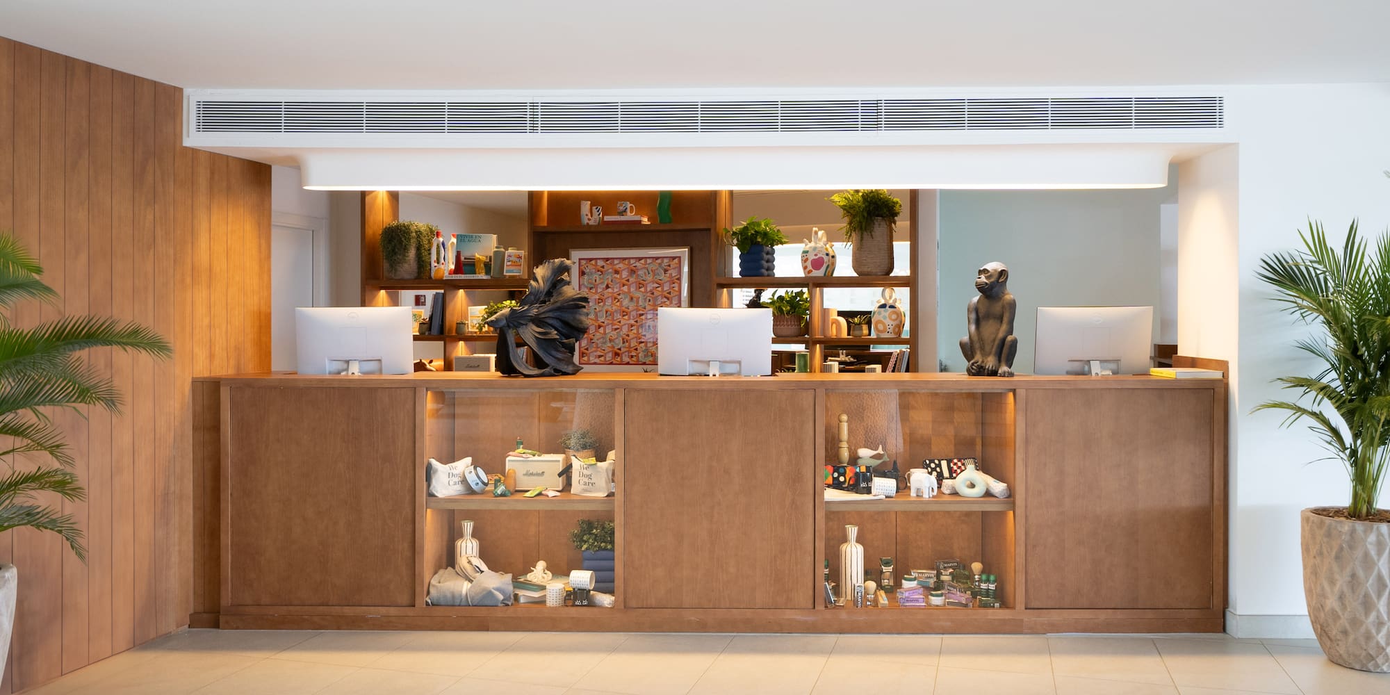 a counter with shelves and objects on it