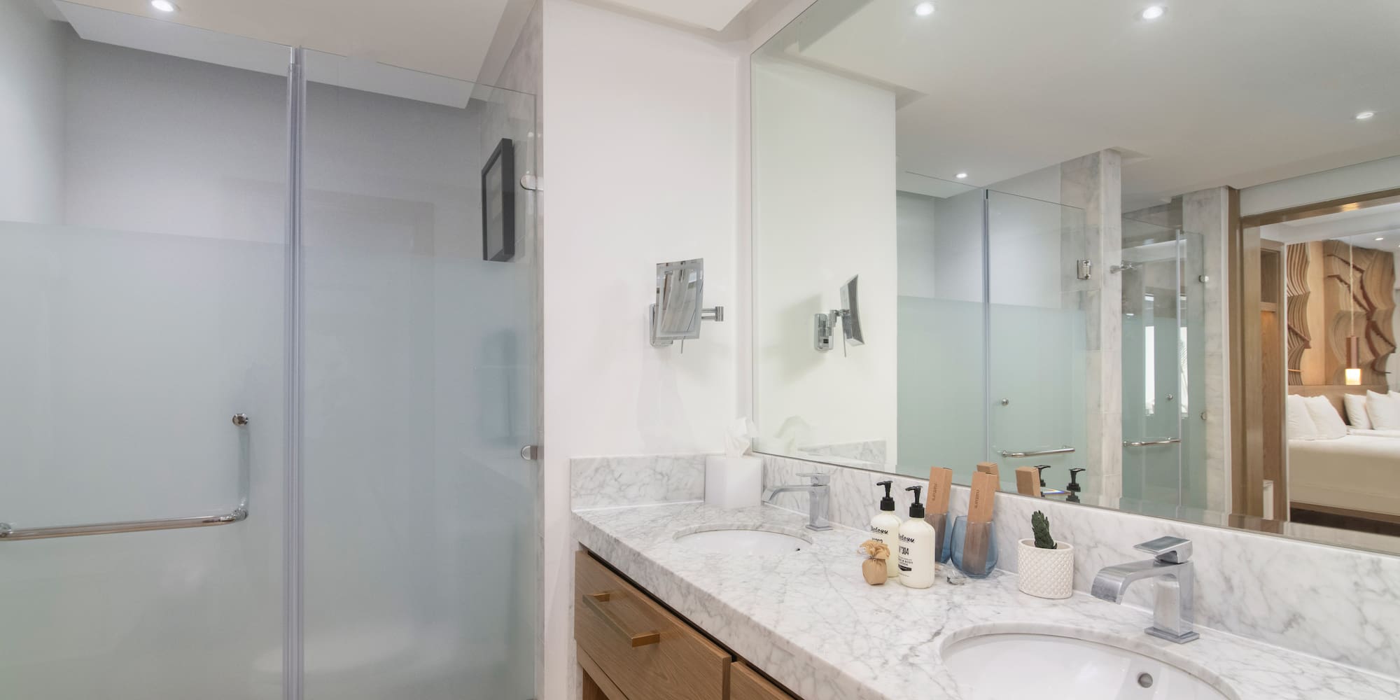 a bathroom with a shower and sink