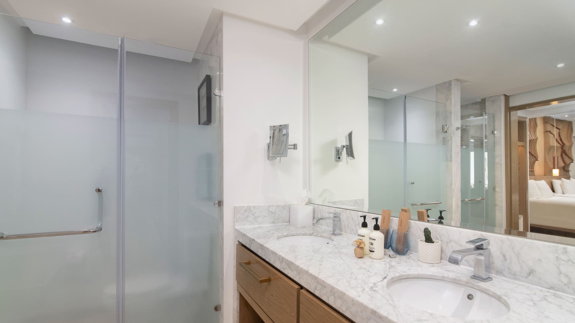 a bathroom with a shower and sink