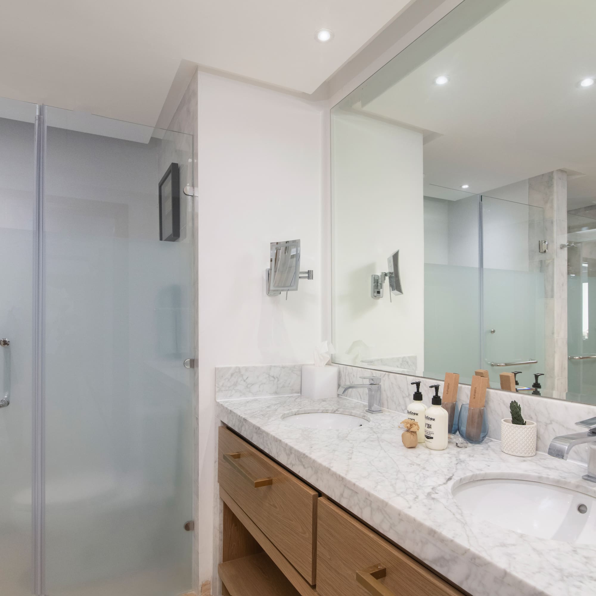 a bathroom with a shower and sink