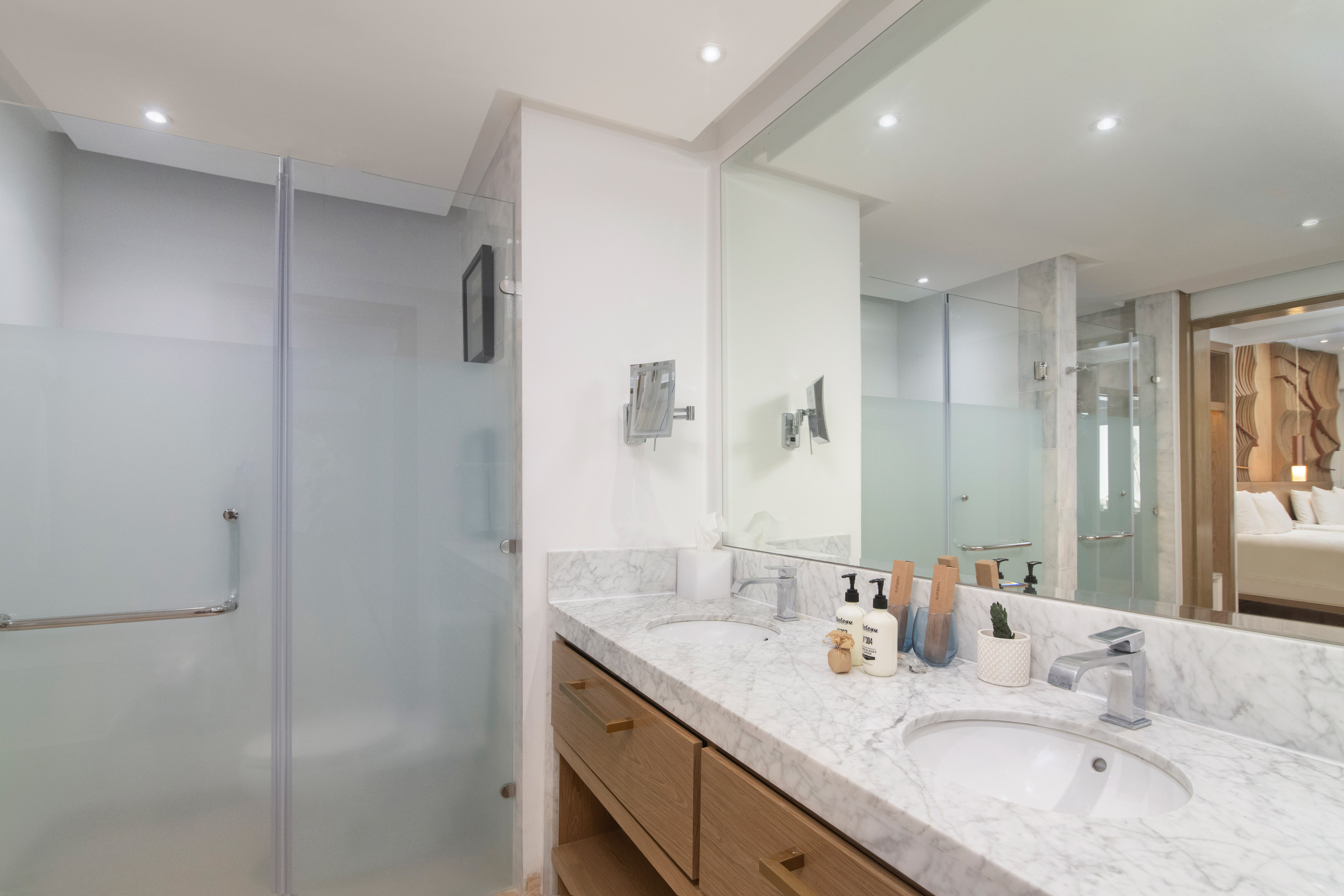 a bathroom with a shower and sink