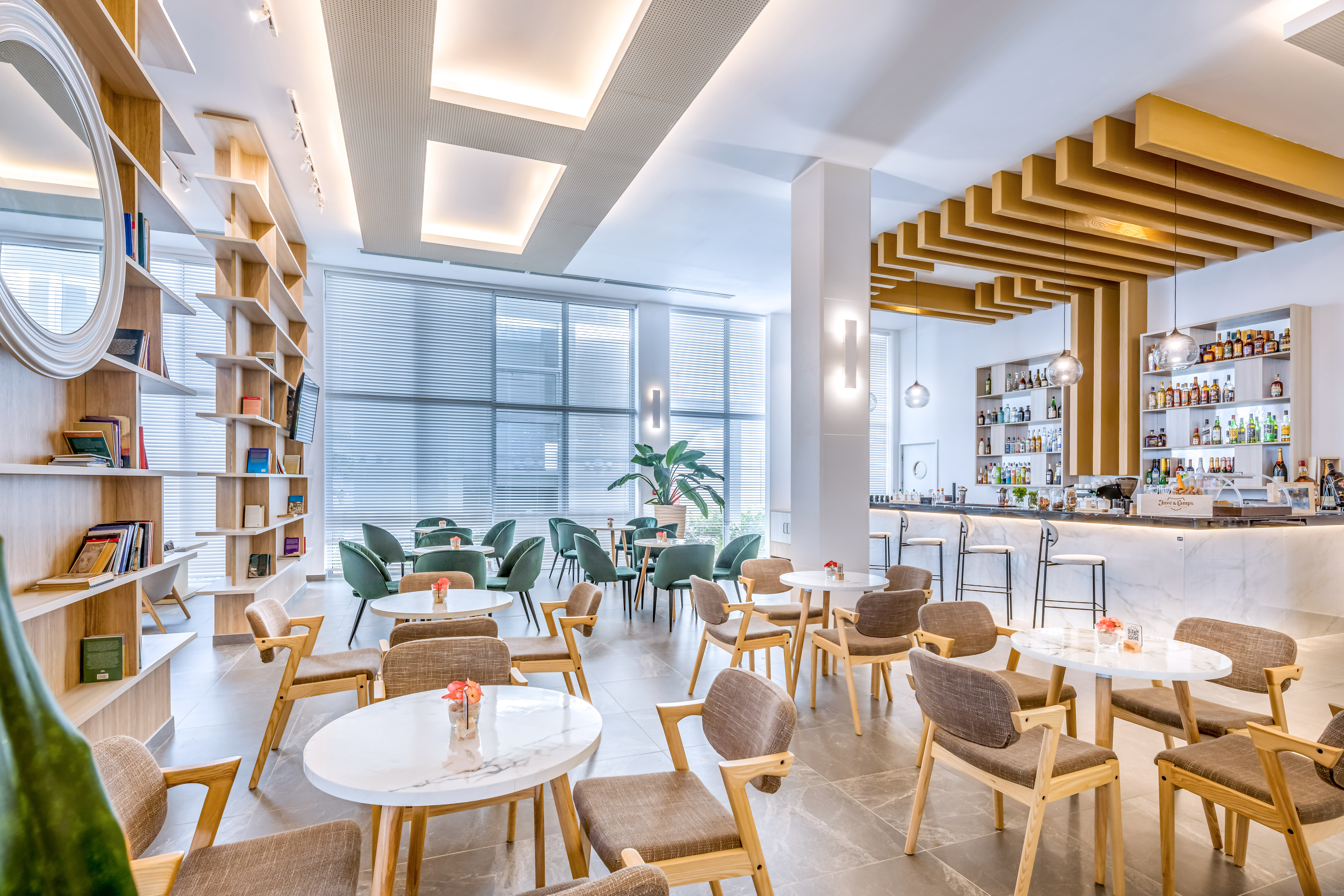 a room with tables and chairs