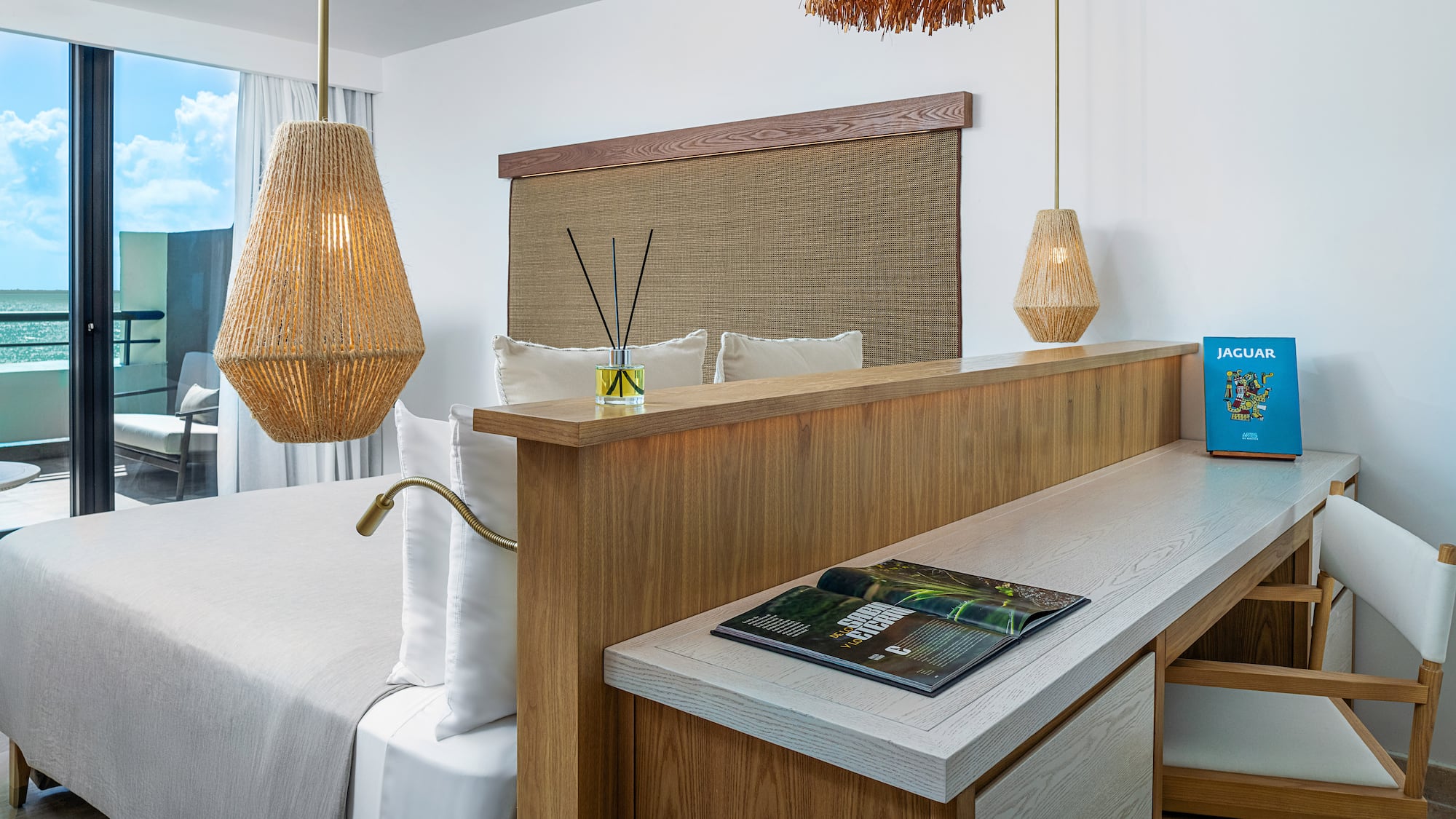 a room with a bed and a desk