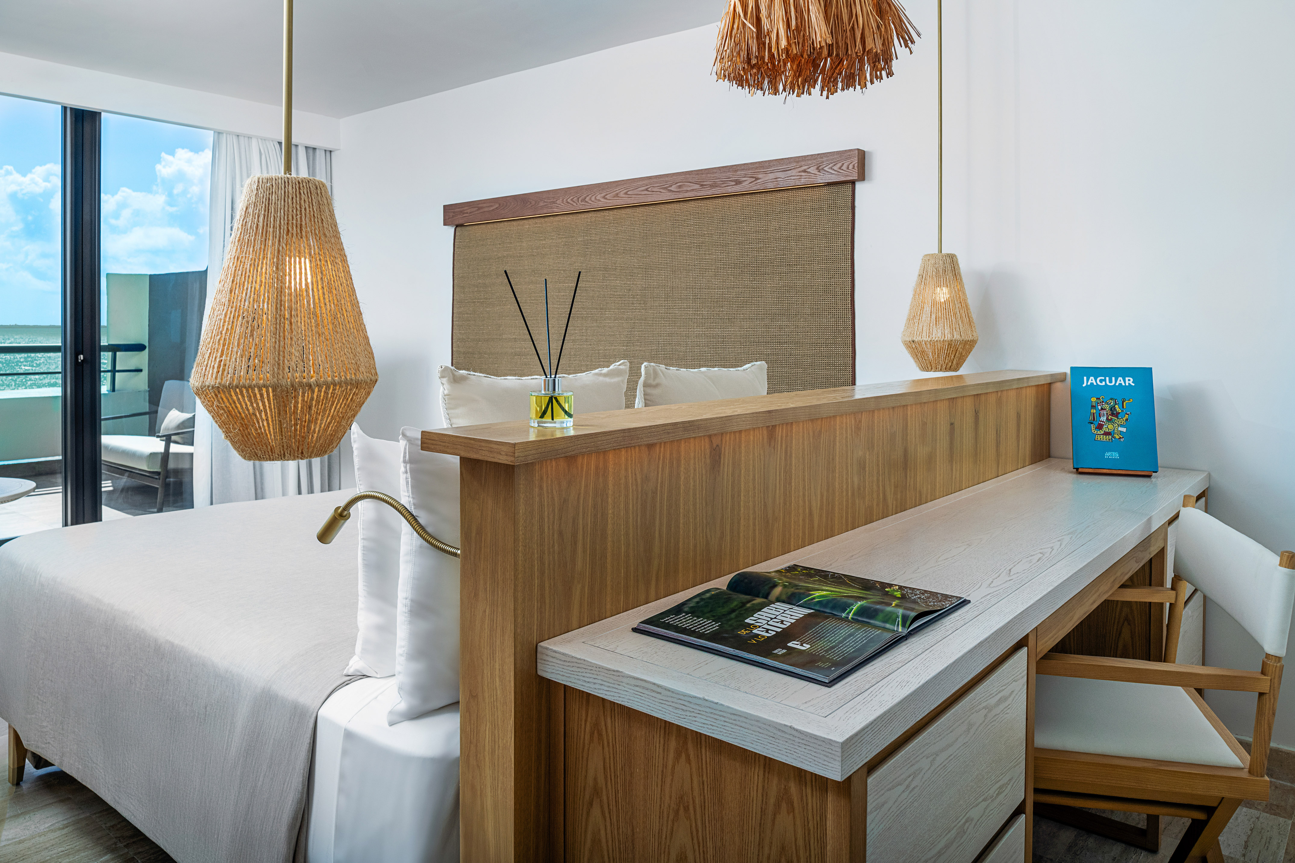 a room with a bed and a desk