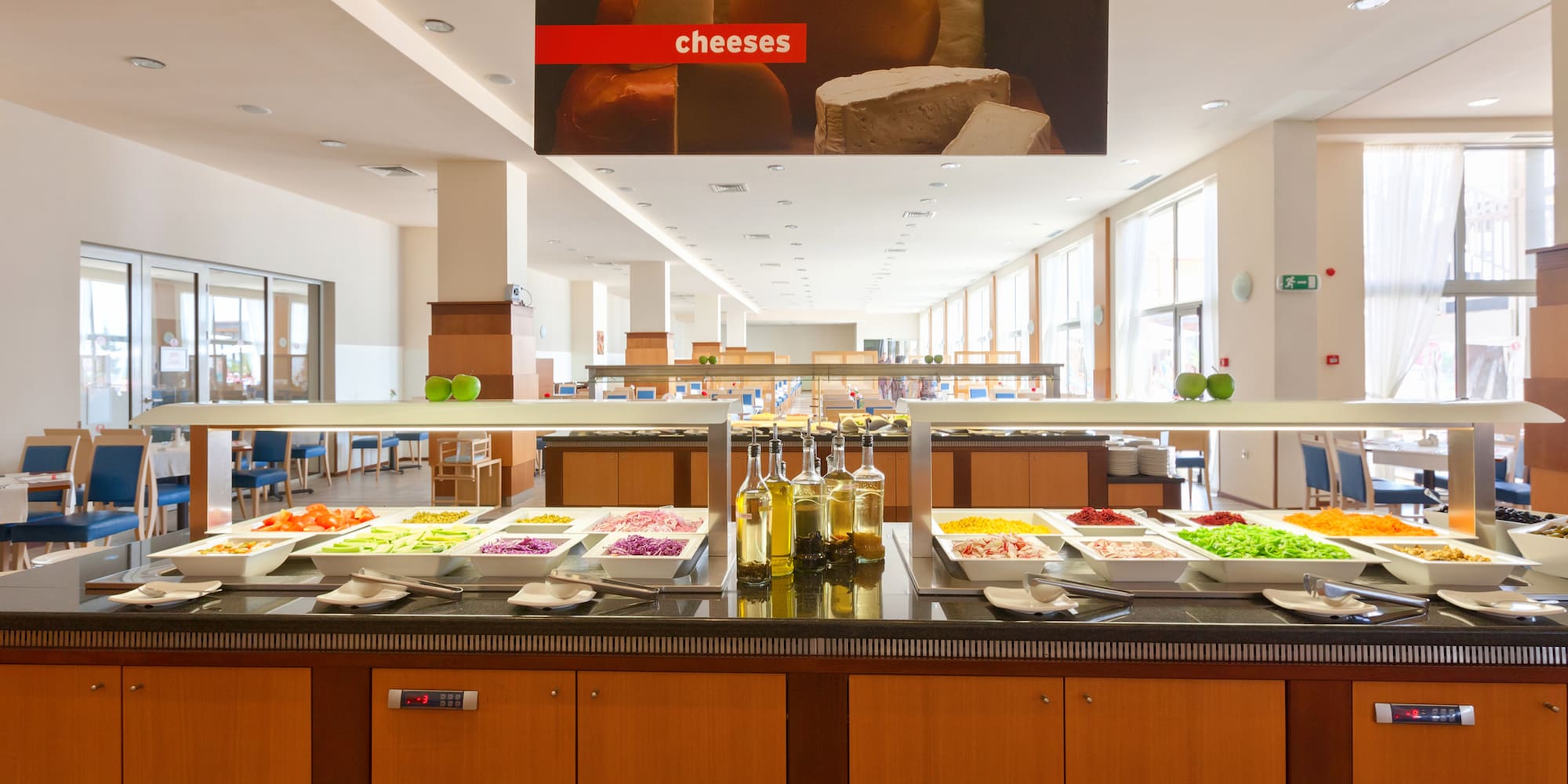 a buffet line with food on it