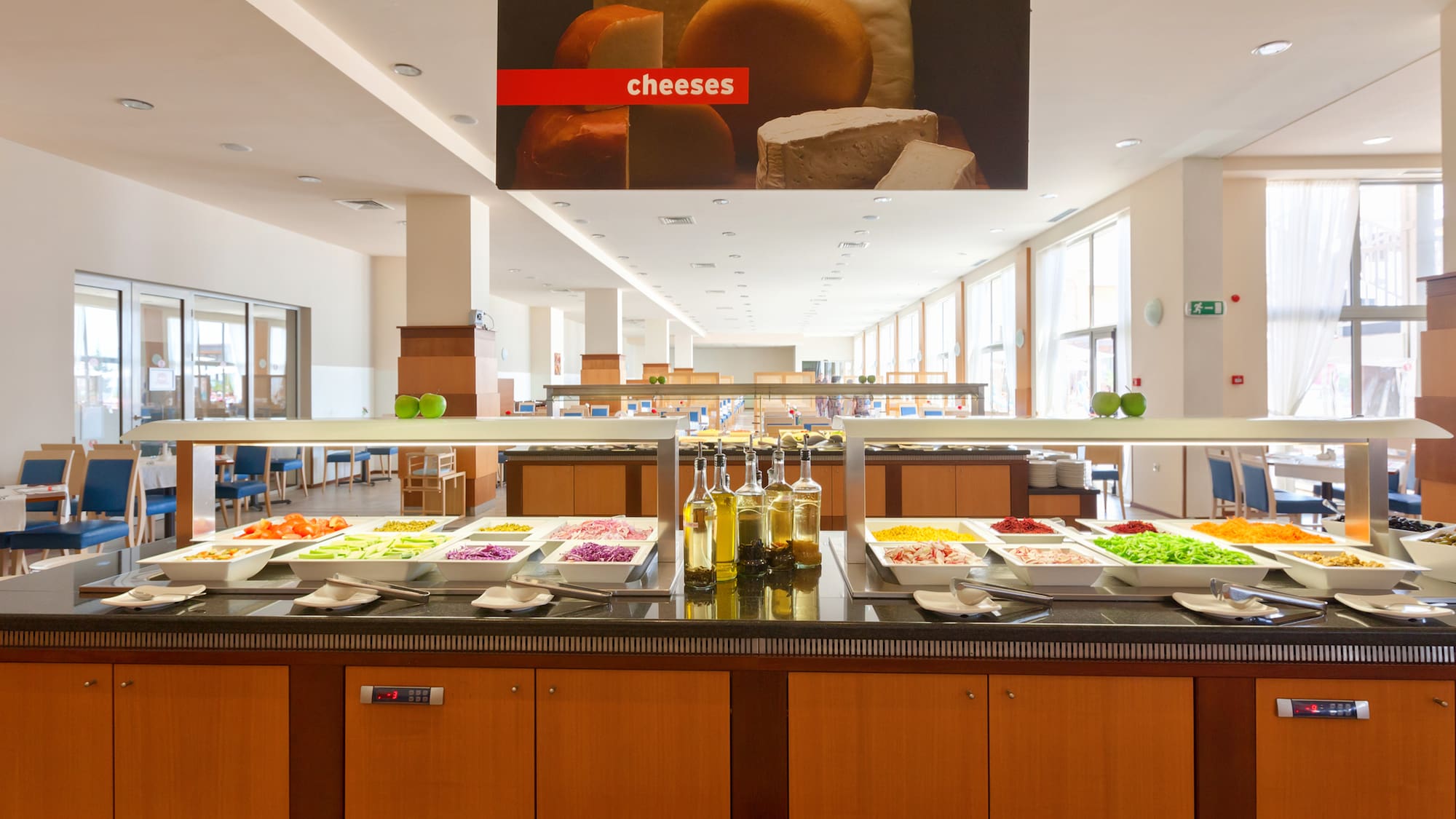 a buffet line with food on it