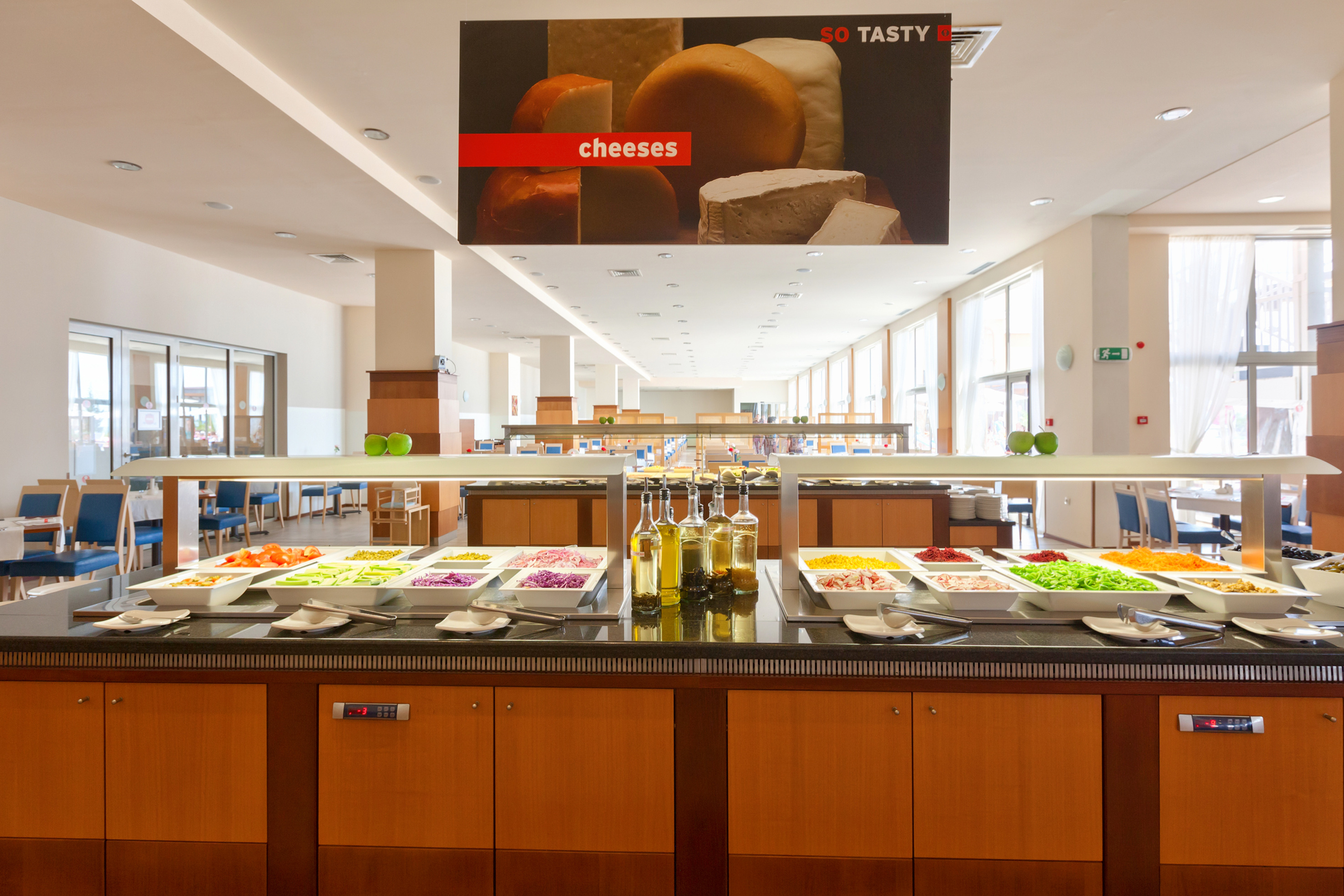 a buffet line with food on it