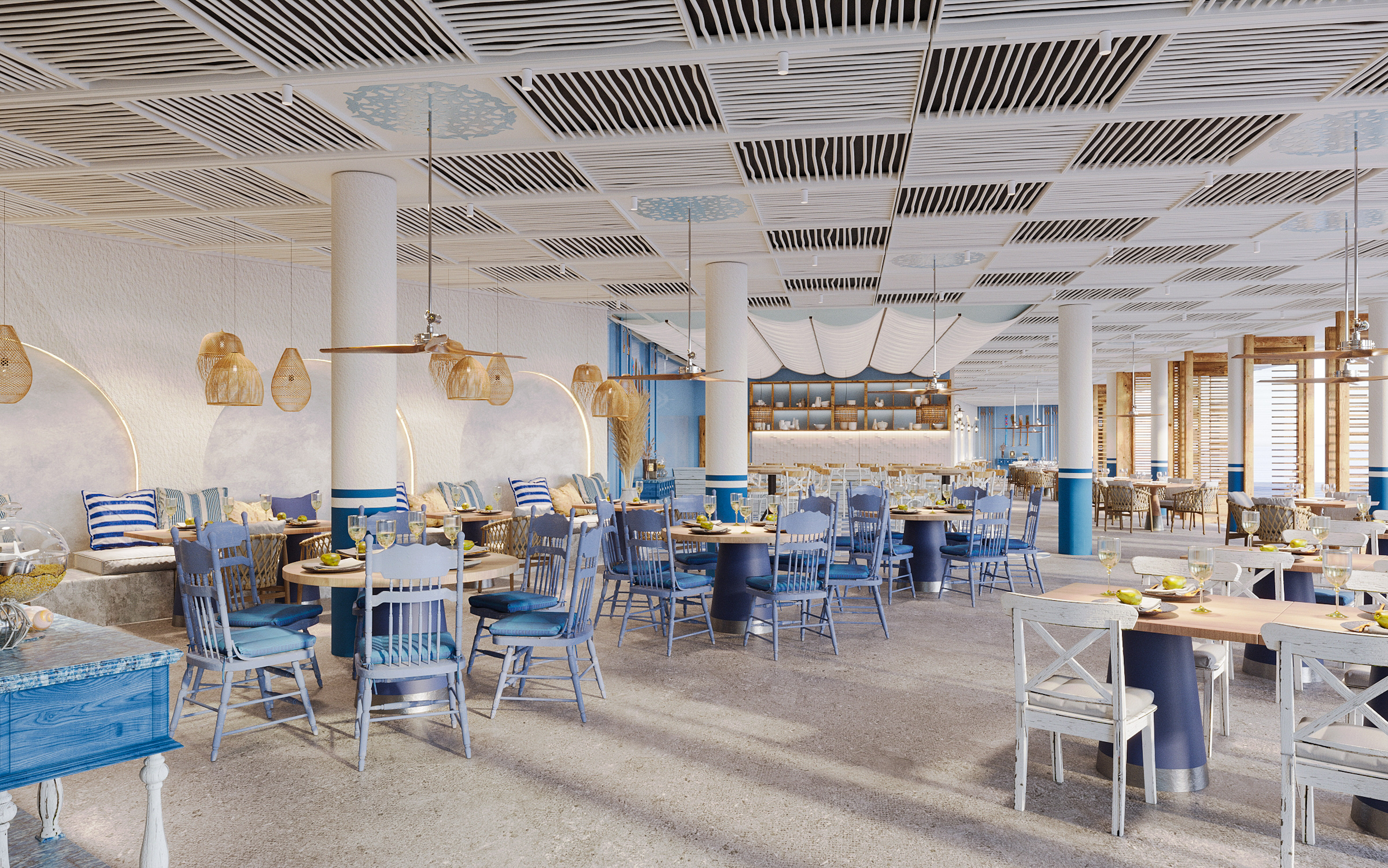 Bright Mediterranean dining room with blue chairs and white coastal decor.