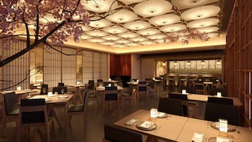 a restaurant with tables and chairs