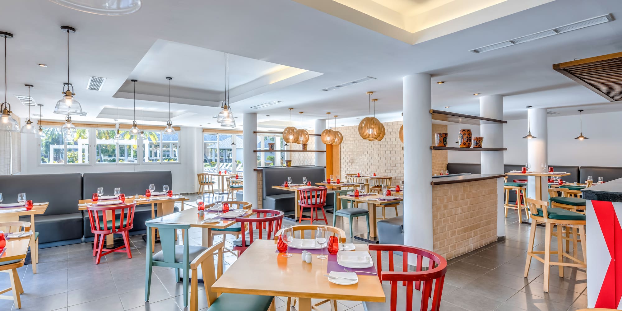 a restaurant with tables and chairs