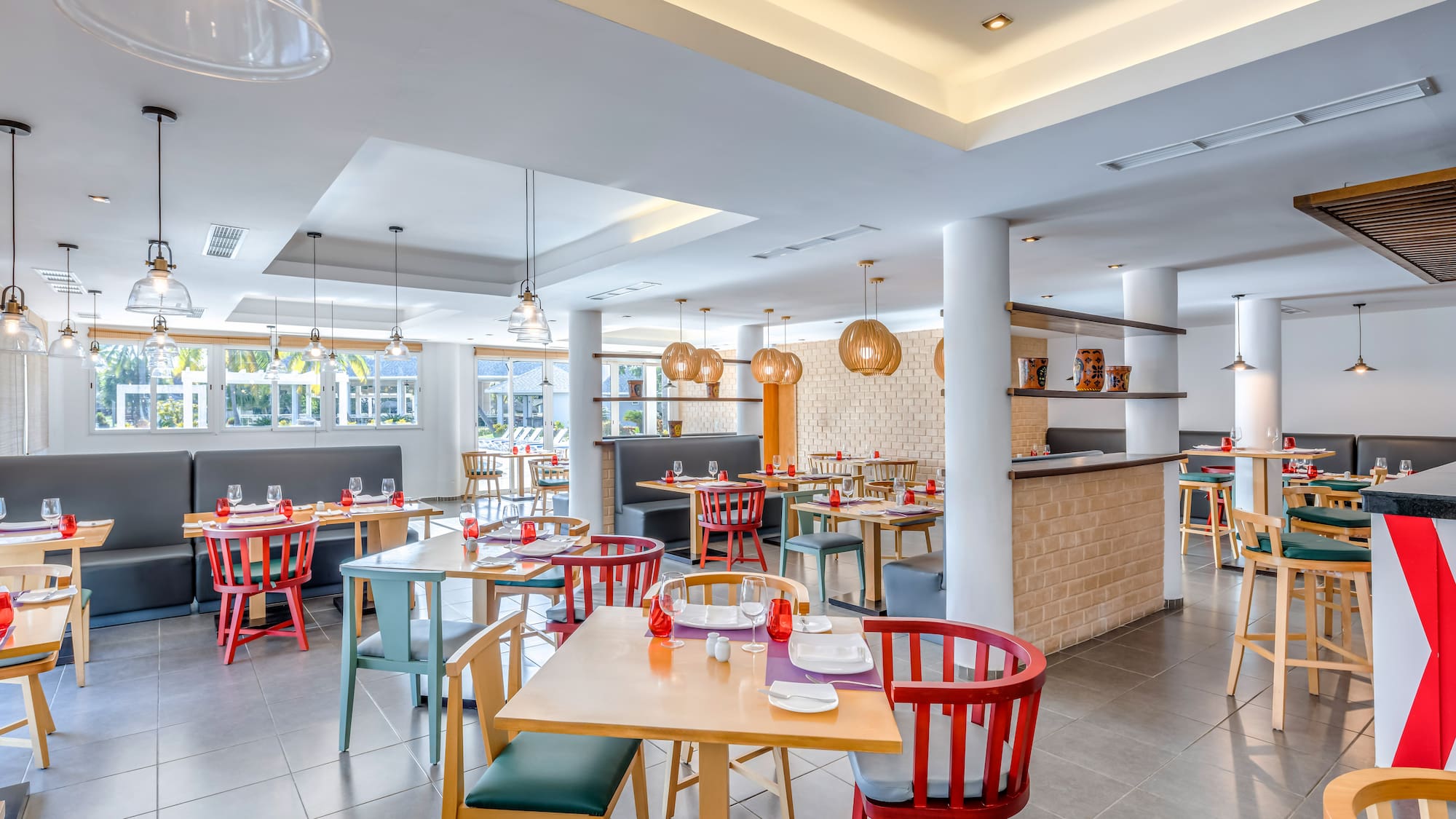 a restaurant with tables and chairs