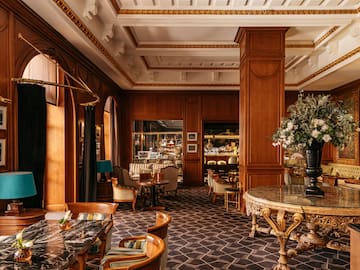 a room with tables and chairs