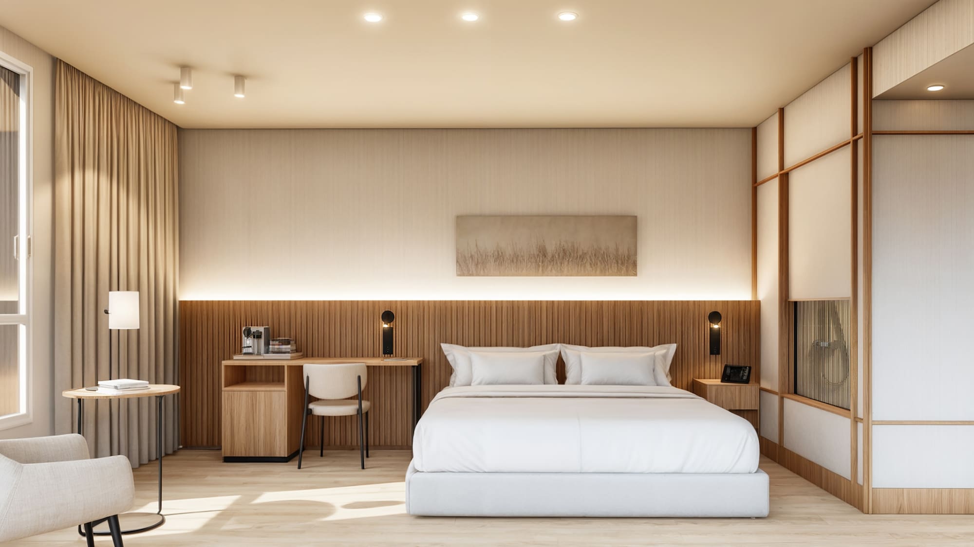 Suite de hotel moderna con cama blanca, decoración neutra y detalles de madera.