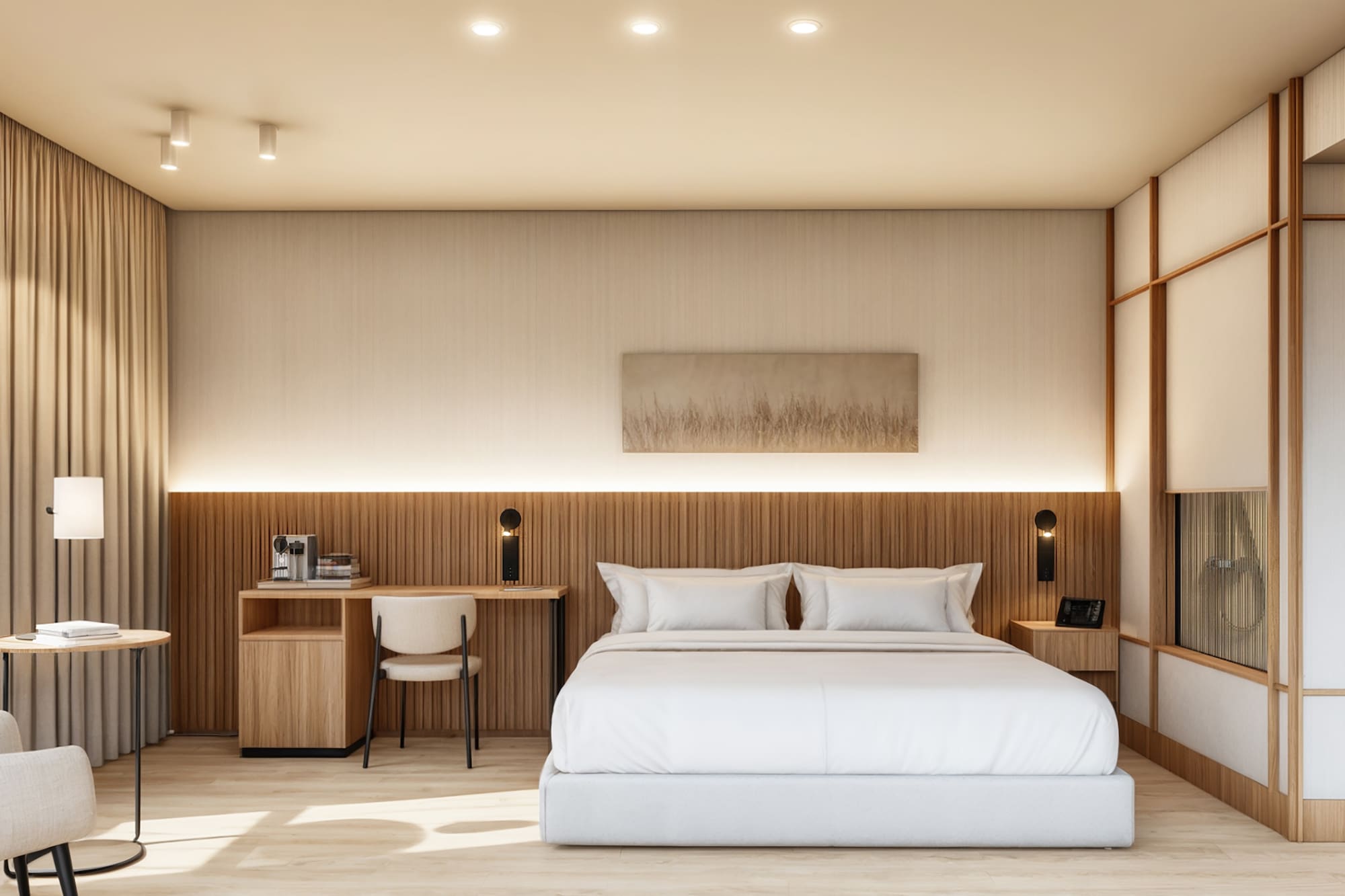 Suite de hotel moderna con cama blanca, decoración neutra y detalles de madera.