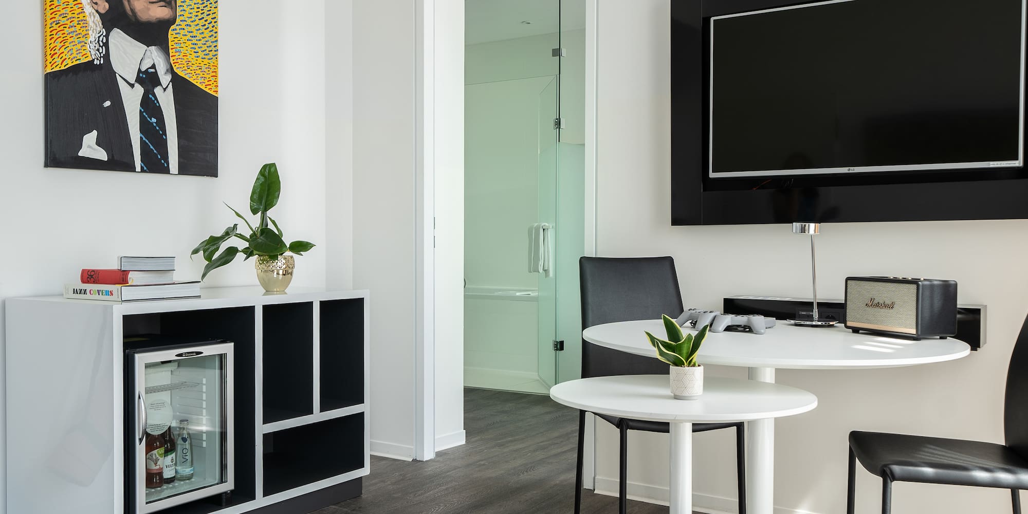 a room with a tv and a table