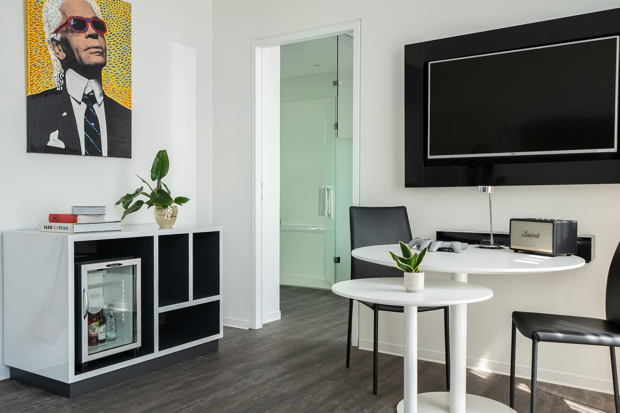 a room with a tv and a table