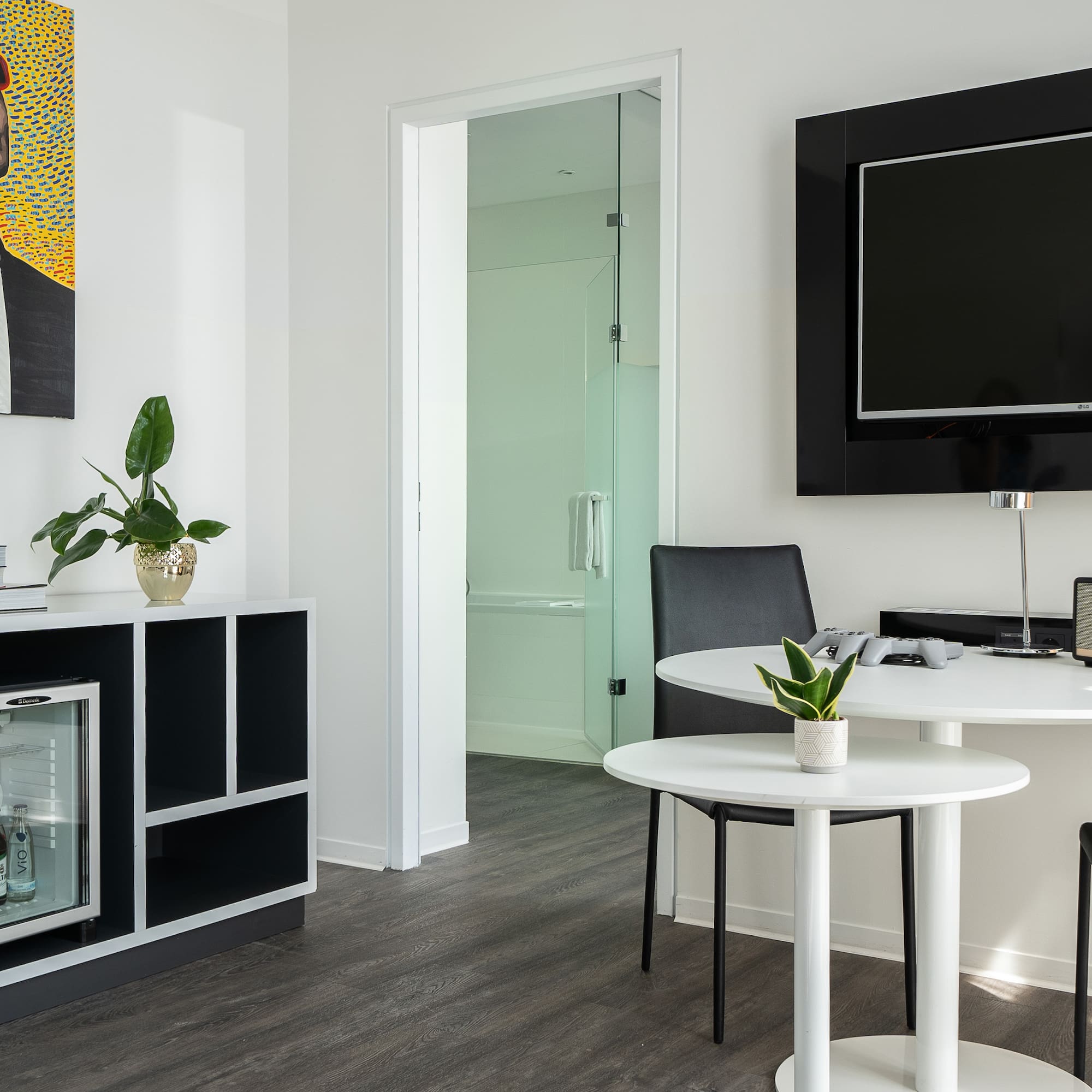 a room with a tv and a table