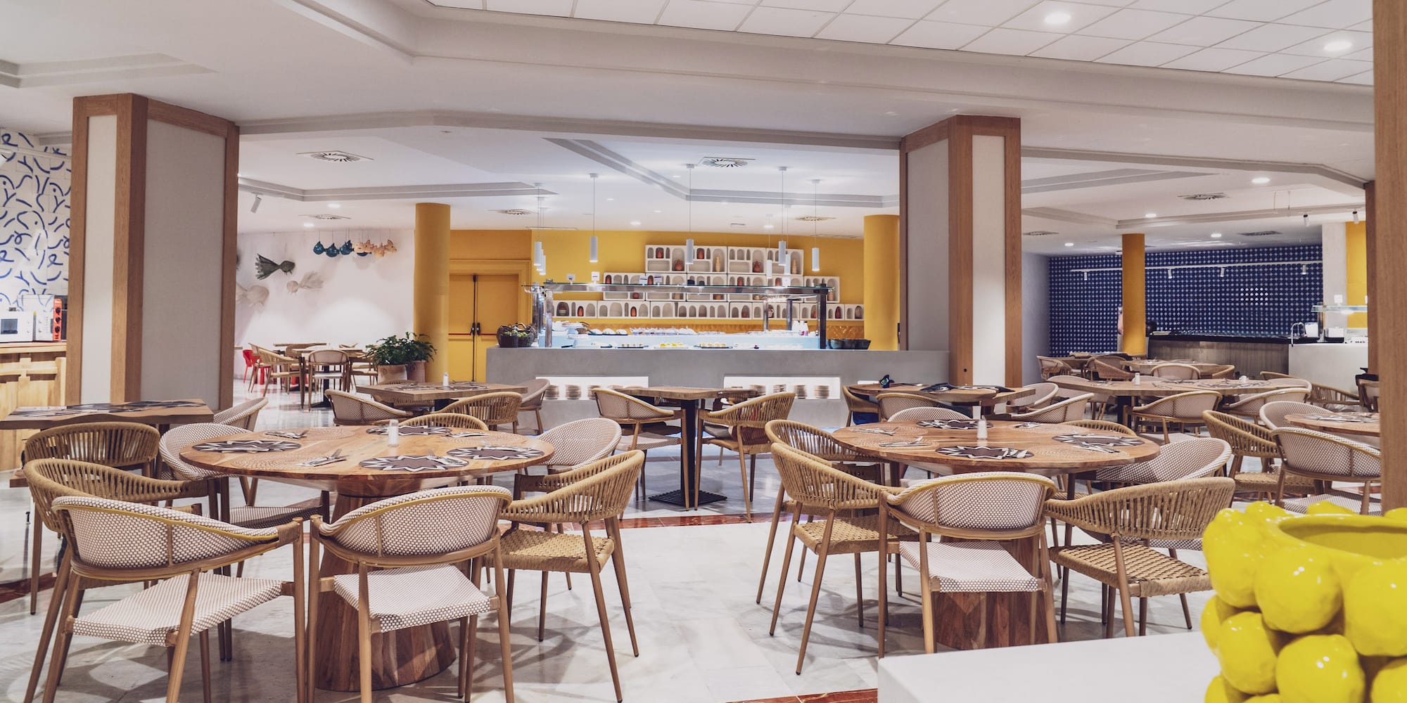 a room with tables and chairs