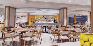 a room with tables and chairs