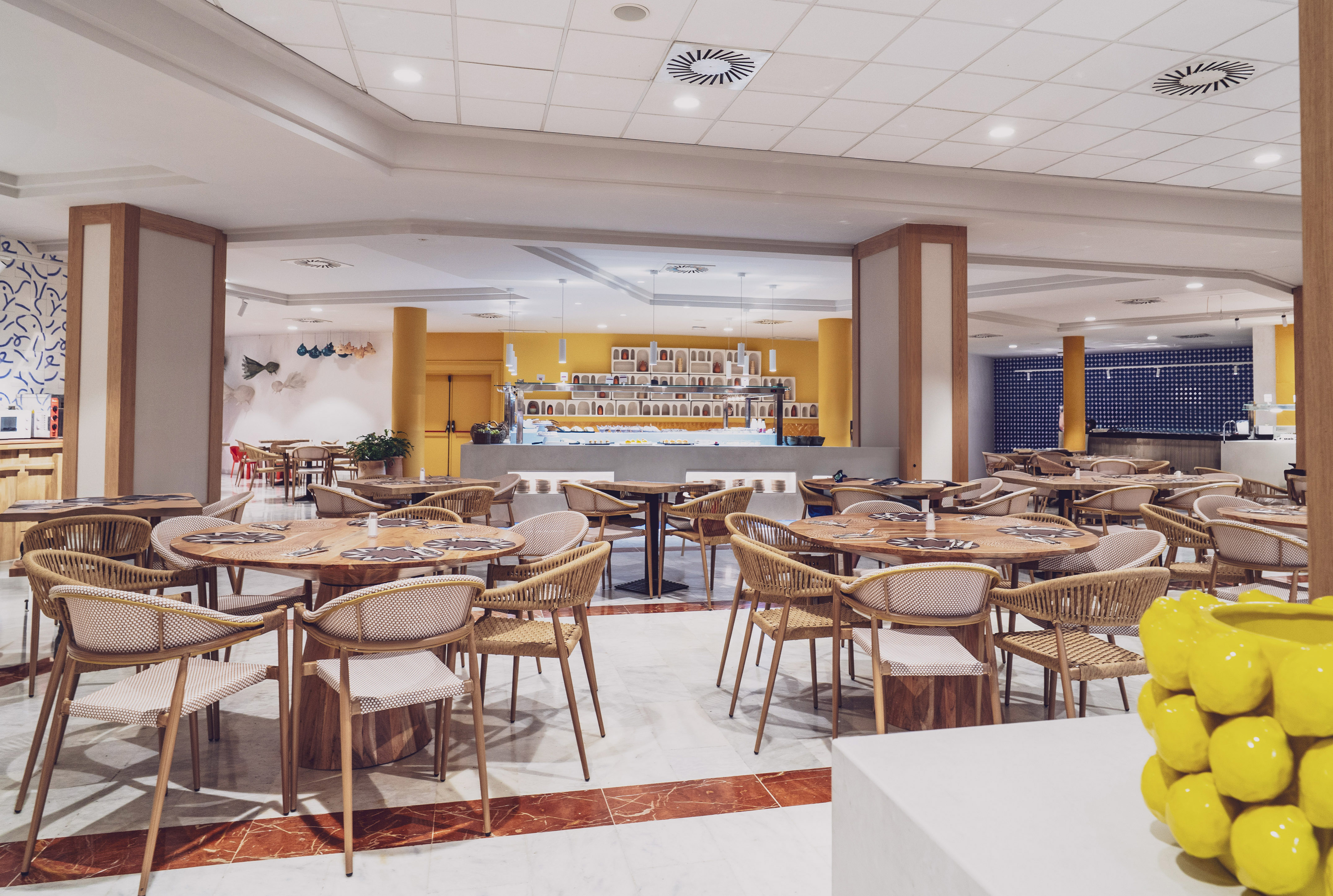 a room with tables and chairs