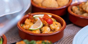 a group of bowls of food