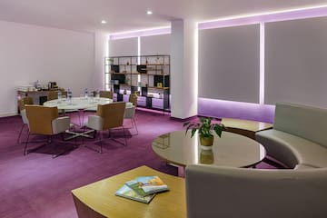 a room with tables and chairs