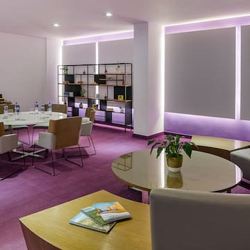 a room with tables and chairs