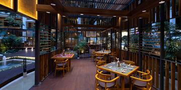 a restaurant with tables and chairs