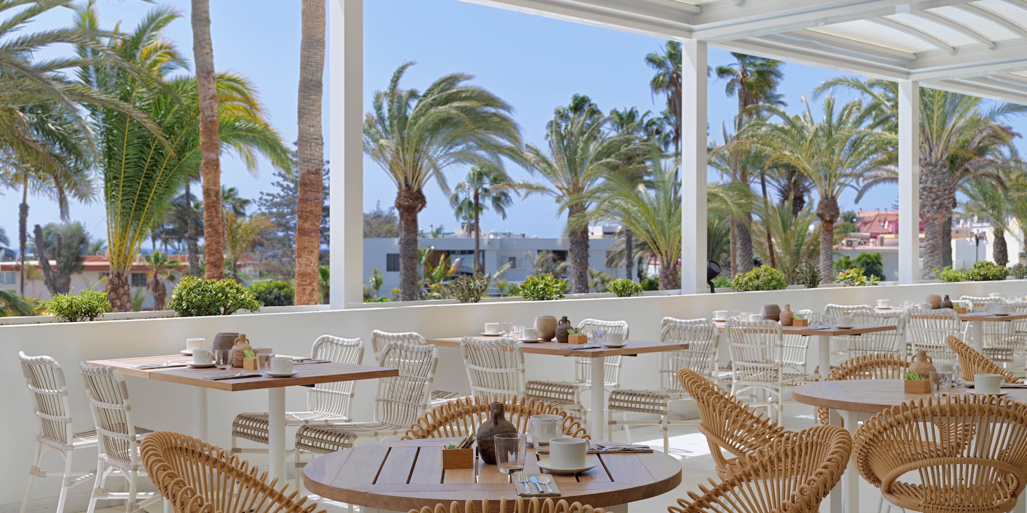 a restaurant with tables and chairs