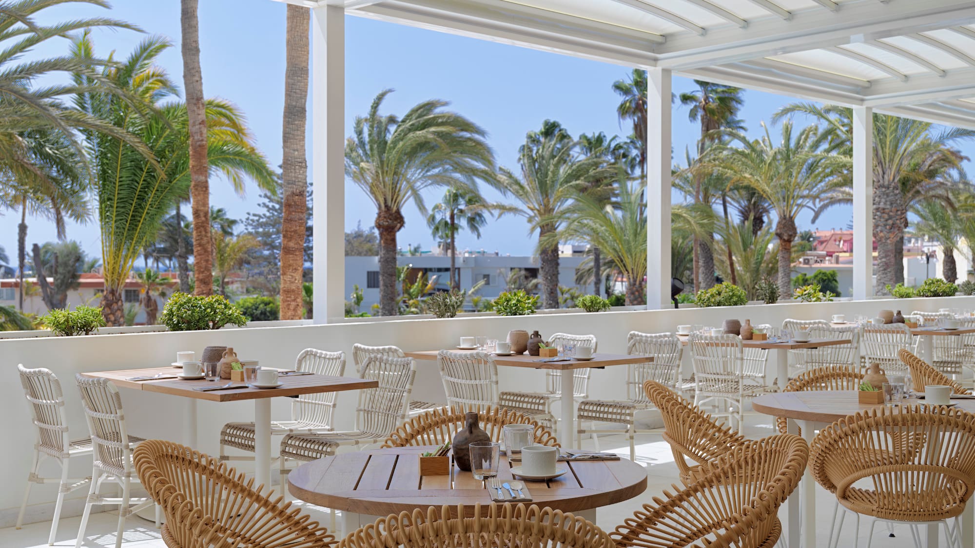a restaurant with tables and chairs